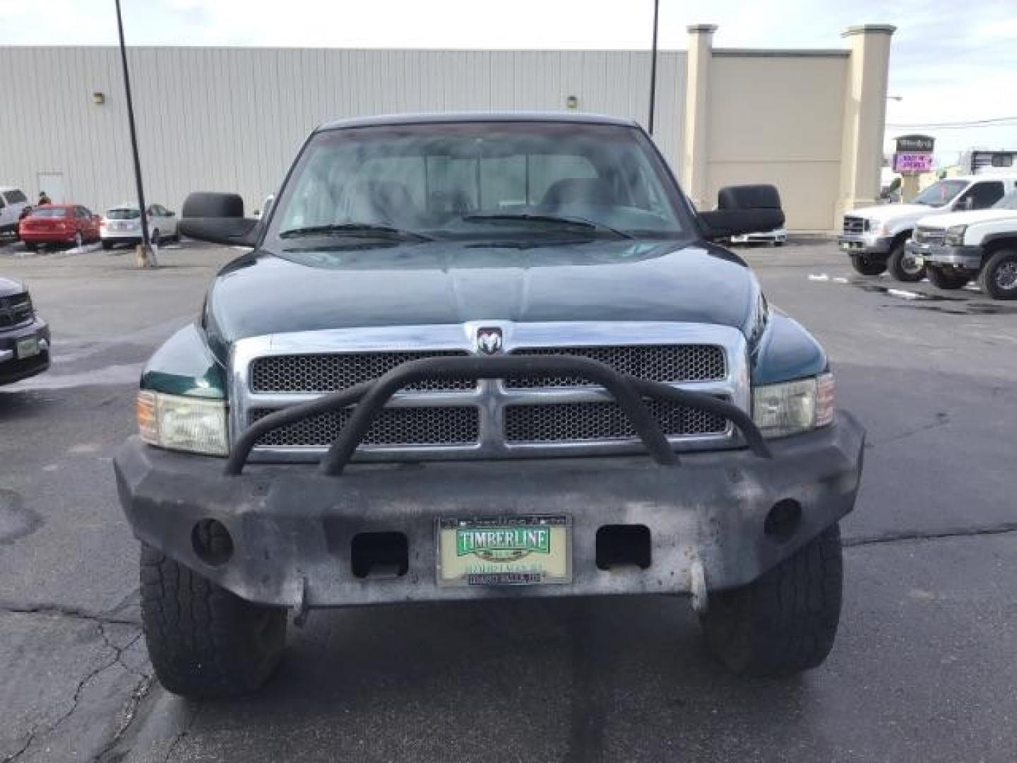 1998 GREEN /Mist Gray Cloth Dodge Ram 2500 Quad Cab 6.5-ft. Bed 4WD (1B7KF2360WJ) with an 5.9L L6 OHV 24V TURBO DIESEL engine, 5-Speed Manual transmission, located at 1235 N Woodruff Ave., Idaho Falls, 83401, (208) 523-1053, 43.507172, -112.000488 - At Timberline Auto it is always easy to find a great deal on your next vehicle! Our experienced sales staff can help find the right vehicle will fit your needs. Our knowledgeable finance department has options for almost any credit score. We offer many warranty contract options to protect you new pr - Photo#7