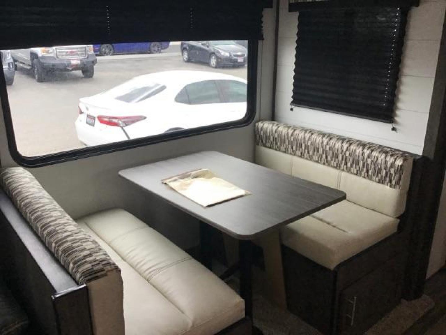 2021 WHITE Riverside RV INTREPID RB200 (59CCC2920ML) , located at 1235 N Woodruff Ave., Idaho Falls, 83401, (208) 523-1053, 43.507172, -112.000488 - 4 leveling jacks, stabilizer with heavy duty adjustable drop hitch, outdoor speakers and lights, power awning and slides, 500# rear cargo rack, new tires, campground cable tv hookup, multiple USB charging ports, easy access fire extinguisher, dual recliners with cup holders, Inno flame fireplace, ga - Photo#13