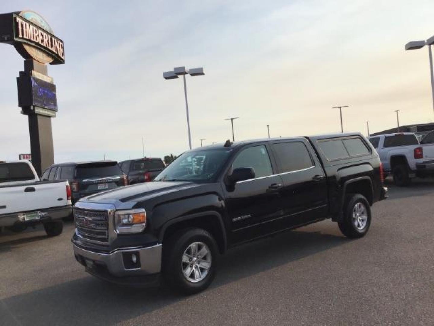 2015 Onyx Black /Jet Black, cloth GMC Sierra 1500 SLE Crew Cab Short Box 2WD (3GTP1UEC2FG) with an 5.3L V8 OHV 16V engine, 6-Speed Automatic transmission, located at 1235 N Woodruff Ave., Idaho Falls, 83401, (208) 523-1053, 43.507172, -112.000488 - This 2015 GMC 1500 SLT, has the 5.3L motor. It has a spray in bedliner, AM/FM CD, keyless remote, Alloy wheels. Interior and exterior and in very good condition At Timberline Auto it is always easy to find a great deal on your next vehicle! Our experienced sales staff can help find the right vehicle - Photo#0