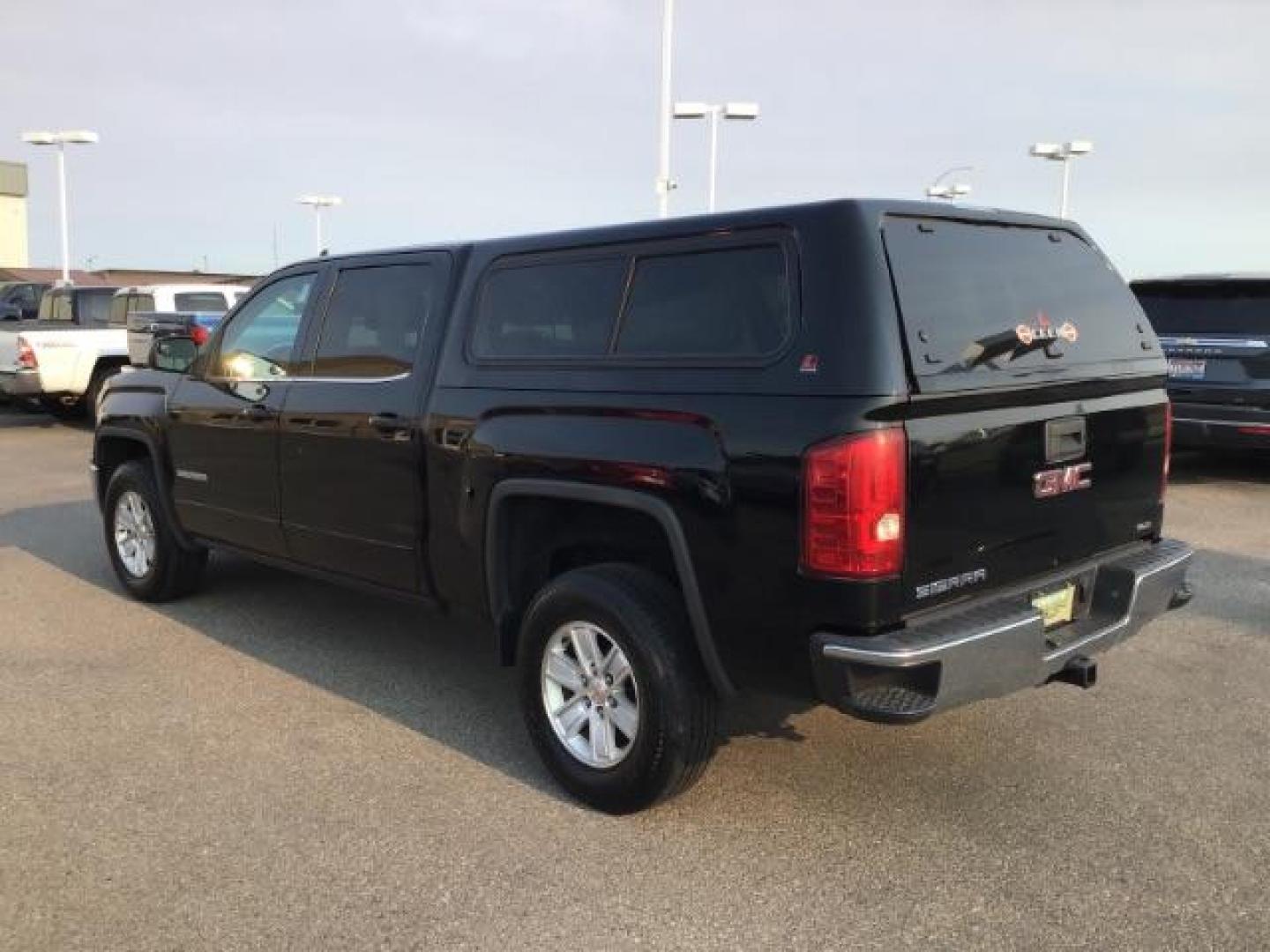 2015 Onyx Black /Jet Black, cloth GMC Sierra 1500 SLE Crew Cab Short Box 2WD (3GTP1UEC2FG) with an 5.3L V8 OHV 16V engine, 6-Speed Automatic transmission, located at 1235 N Woodruff Ave., Idaho Falls, 83401, (208) 523-1053, 43.507172, -112.000488 - This 2015 GMC 1500 SLT, has the 5.3L motor. It has a spray in bedliner, AM/FM CD, keyless remote, Alloy wheels. Interior and exterior and in very good condition At Timberline Auto it is always easy to find a great deal on your next vehicle! Our experienced sales staff can help find the right vehicle - Photo#2