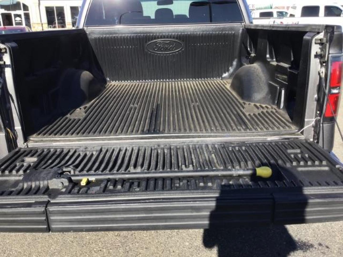 2013 GRAY /CLOTH Ford F-150 FX4 SuperCrew 5.5-ft. Bed 4WD (1FTFW1EF5DK) with an 5.0L V8 engine, 6-Speed Automatic transmission, located at 1235 N Woodruff Ave., Idaho Falls, 83401, (208) 523-1053, 43.507172, -112.000488 - This 2013 Ford F150 FX4, only has 87,414 miles. Comes with after market wheel, after market grill, red interior accents, steering wheel audio controls. It has a leveling kit. At Timberline Auto it is always easy to find a great deal on your next vehicle! Our experienced sales staff can help find the - Photo#21