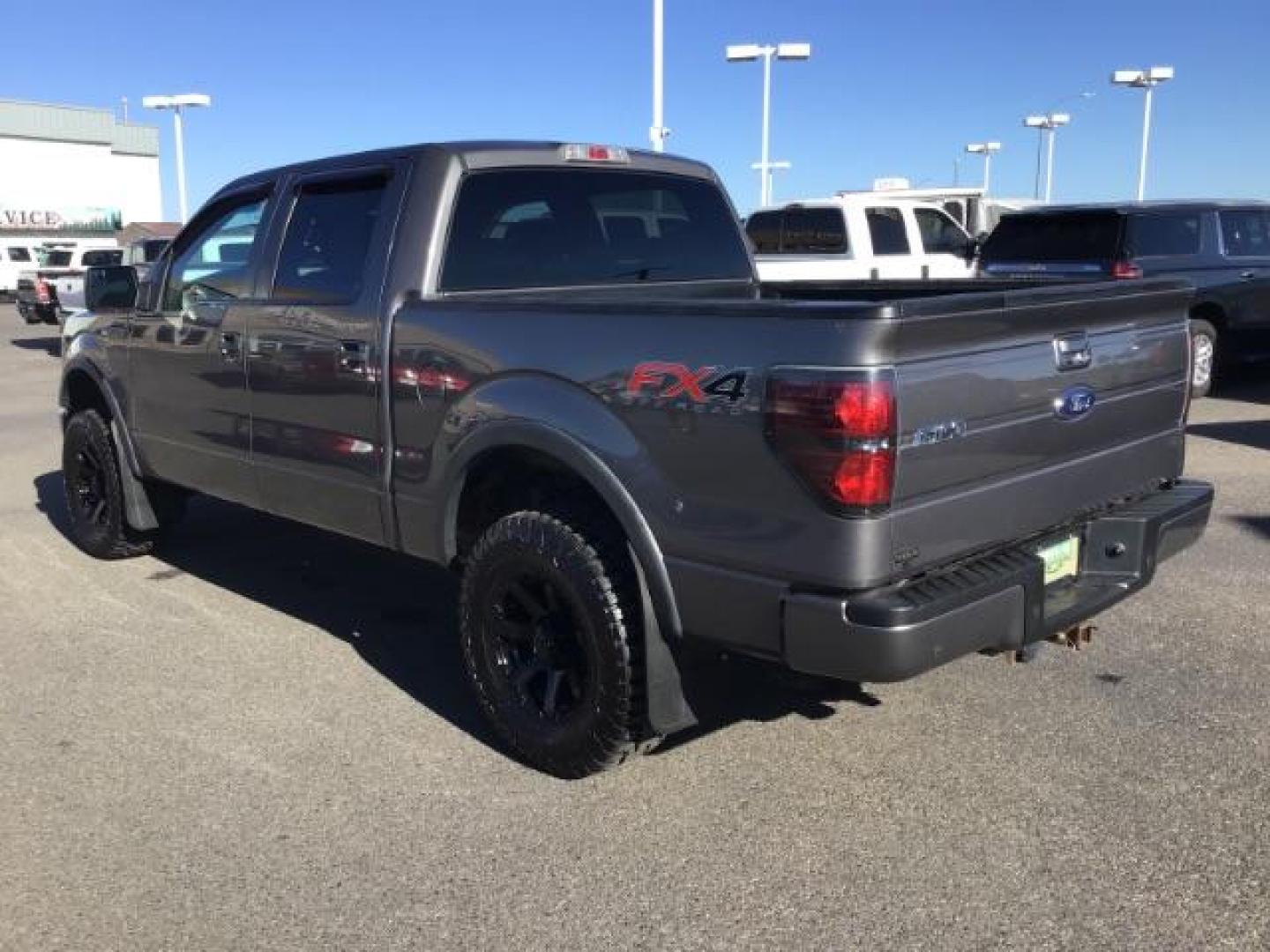 2013 GRAY /CLOTH Ford F-150 FX4 SuperCrew 5.5-ft. Bed 4WD (1FTFW1EF5DK) with an 5.0L V8 engine, 6-Speed Automatic transmission, located at 1235 N Woodruff Ave., Idaho Falls, 83401, (208) 523-1053, 43.507172, -112.000488 - This 2013 Ford F150 FX4, only has 87,414 miles. Comes with after market wheel, after market grill, red interior accents, steering wheel audio controls. It has a leveling kit. At Timberline Auto it is always easy to find a great deal on your next vehicle! Our experienced sales staff can help find the - Photo#2