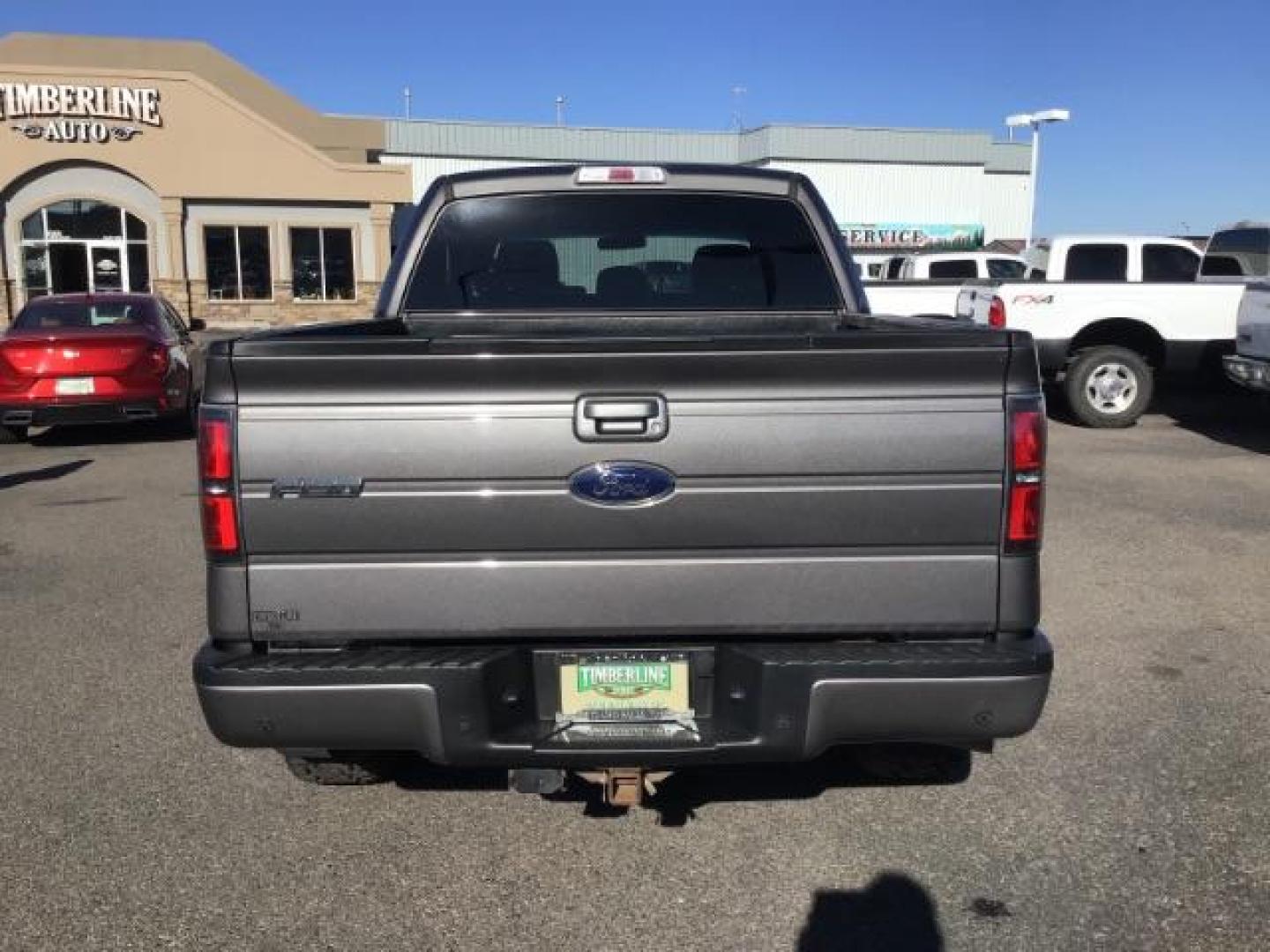 2013 GRAY /CLOTH Ford F-150 FX4 SuperCrew 5.5-ft. Bed 4WD (1FTFW1EF5DK) with an 5.0L V8 engine, 6-Speed Automatic transmission, located at 1235 N Woodruff Ave., Idaho Falls, 83401, (208) 523-1053, 43.507172, -112.000488 - This 2013 Ford F150 FX4, only has 87,414 miles. Comes with after market wheel, after market grill, red interior accents, steering wheel audio controls. It has a leveling kit. At Timberline Auto it is always easy to find a great deal on your next vehicle! Our experienced sales staff can help find the - Photo#3