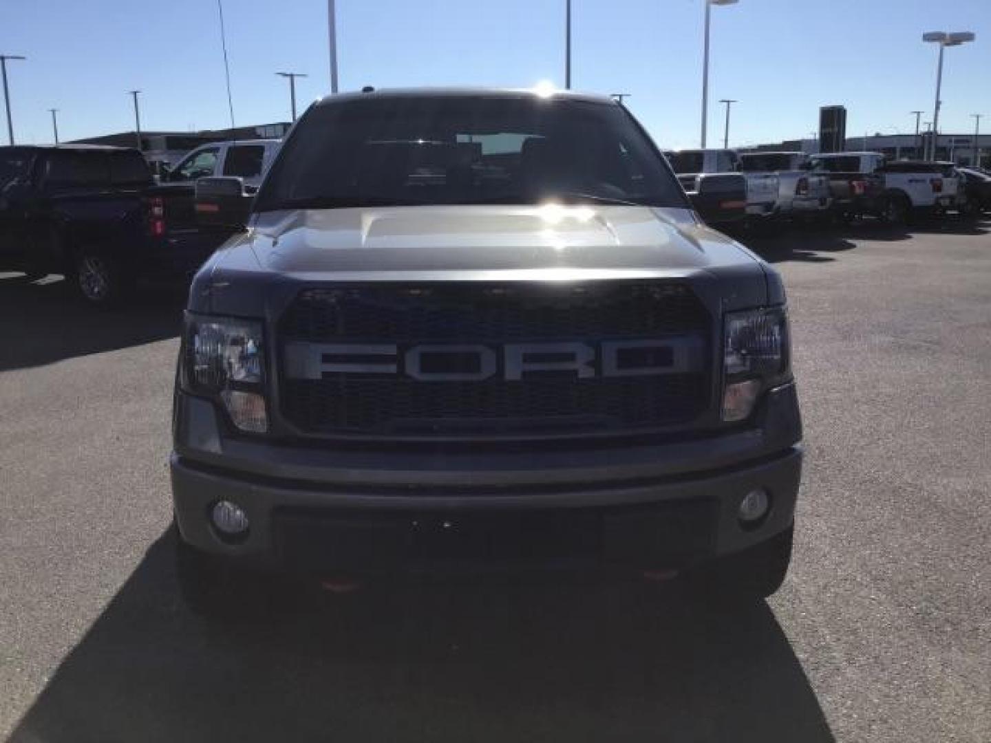 2013 GRAY /CLOTH Ford F-150 FX4 SuperCrew 5.5-ft. Bed 4WD (1FTFW1EF5DK) with an 5.0L V8 engine, 6-Speed Automatic transmission, located at 1235 N Woodruff Ave., Idaho Falls, 83401, (208) 523-1053, 43.507172, -112.000488 - This 2013 Ford F150 FX4, only has 87,414 miles. Comes with after market wheel, after market grill, red interior accents, steering wheel audio controls. It has a leveling kit. At Timberline Auto it is always easy to find a great deal on your next vehicle! Our experienced sales staff can help find the - Photo#7