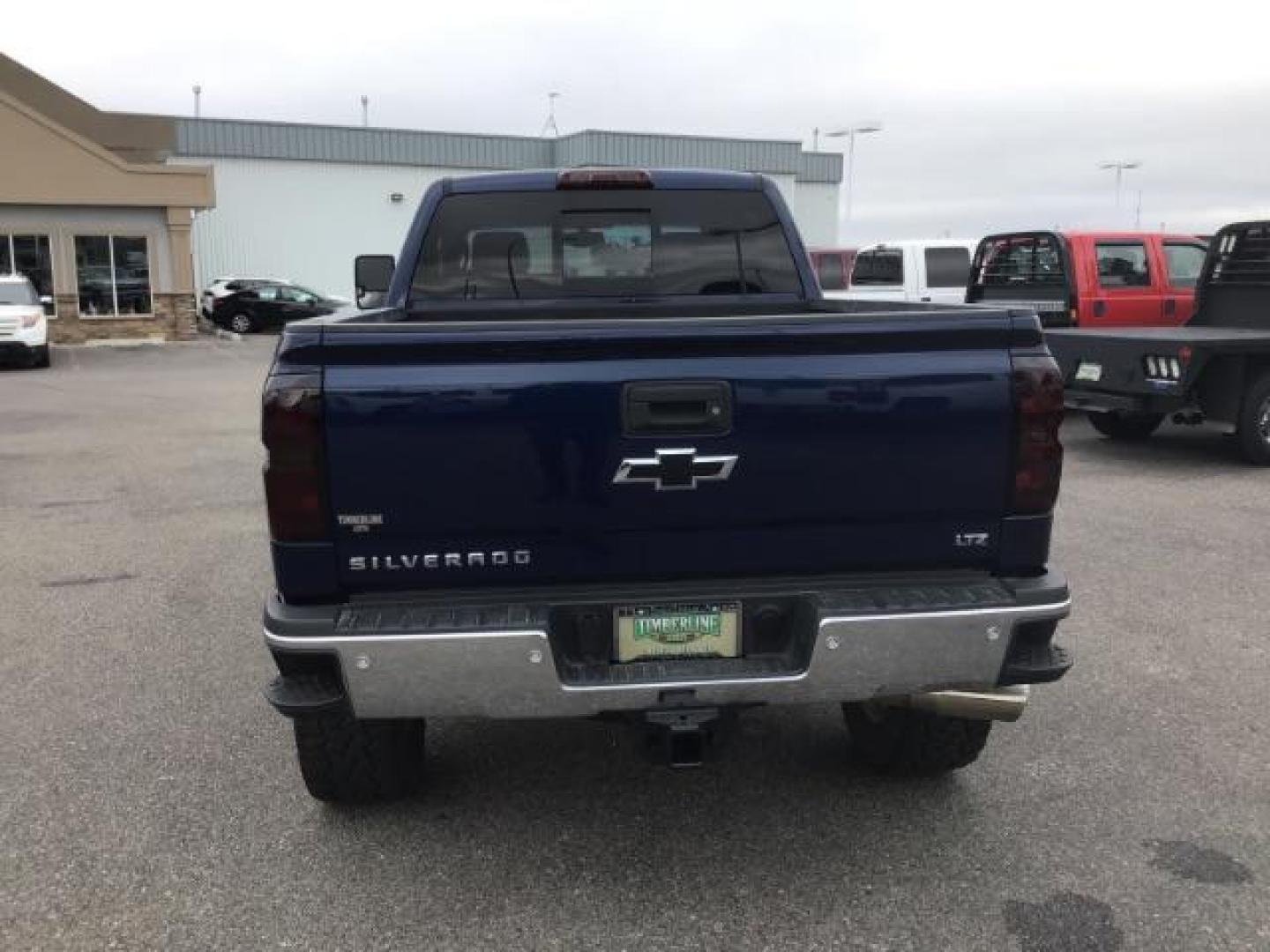 2016 Deep Ocean Blue Metallic /Cocoa/Dune, leather Chevrolet Silverado 3500HD LTZ Crew Cab 4WD (1GC4K0C86GF) with an 6.6L V8 OHV 32V TURBO DIESEL engine, 6-Speed Automatic transmission, located at 1235 N Woodruff Ave., Idaho Falls, 83401, (208) 523-1053, 43.507172, -112.000488 - This 2016 Chevrolet 3500 LTZ, has the 6.6L diesel motor. It has 160,031 miles. It comes with leather interior, tinted windows, back up camera, bluetooth, integrated trailer brake, and spray in bed liner. At Timberline Auto it is always easy to find a great deal on your next vehicle! Our experienced - Photo#3