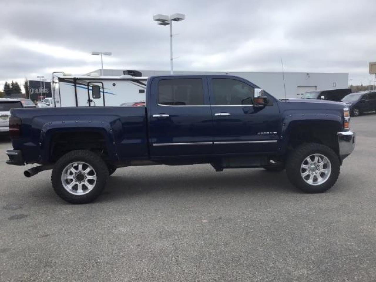 2016 Deep Ocean Blue Metallic /Cocoa/Dune, leather Chevrolet Silverado 3500HD LTZ Crew Cab 4WD (1GC4K0C86GF) with an 6.6L V8 OHV 32V TURBO DIESEL engine, 6-Speed Automatic transmission, located at 1235 N Woodruff Ave., Idaho Falls, 83401, (208) 523-1053, 43.507172, -112.000488 - This 2016 Chevrolet 3500 LTZ, has the 6.6L diesel motor. It has 160,031 miles. It comes with leather interior, tinted windows, back up camera, bluetooth, integrated trailer brake, and spray in bed liner. At Timberline Auto it is always easy to find a great deal on your next vehicle! Our experienced - Photo#5