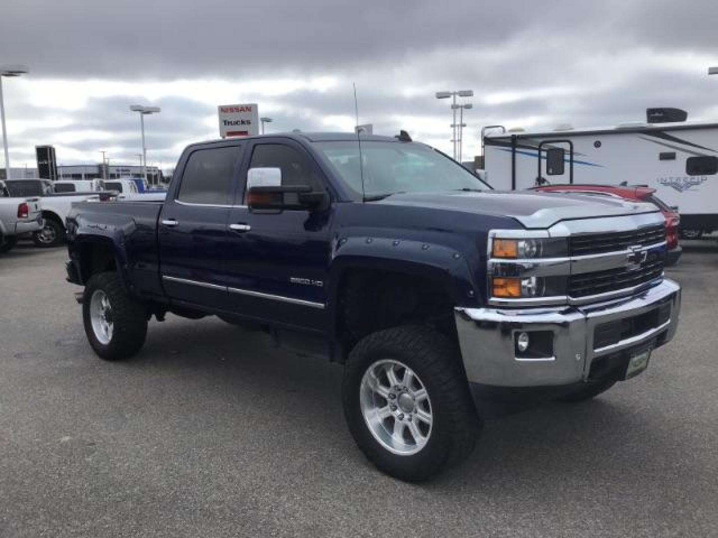 2016 Deep Ocean Blue Metallic /Cocoa/Dune, leather Chevrolet Silverado 3500HD LTZ Crew Cab 4WD (1GC4K0C86GF) with an 6.6L V8 OHV 32V TURBO DIESEL engine, 6-Speed Automatic transmission, located at 1235 N Woodruff Ave., Idaho Falls, 83401, (208) 523-1053, 43.507172, -112.000488 - This 2016 Chevrolet 3500 LTZ, has the 6.6L diesel motor. It has 160,031 miles. It comes with leather interior, tinted windows, back up camera, bluetooth, integrated trailer brake, and spray in bed liner. At Timberline Auto it is always easy to find a great deal on your next vehicle! Our experienced - Photo#6