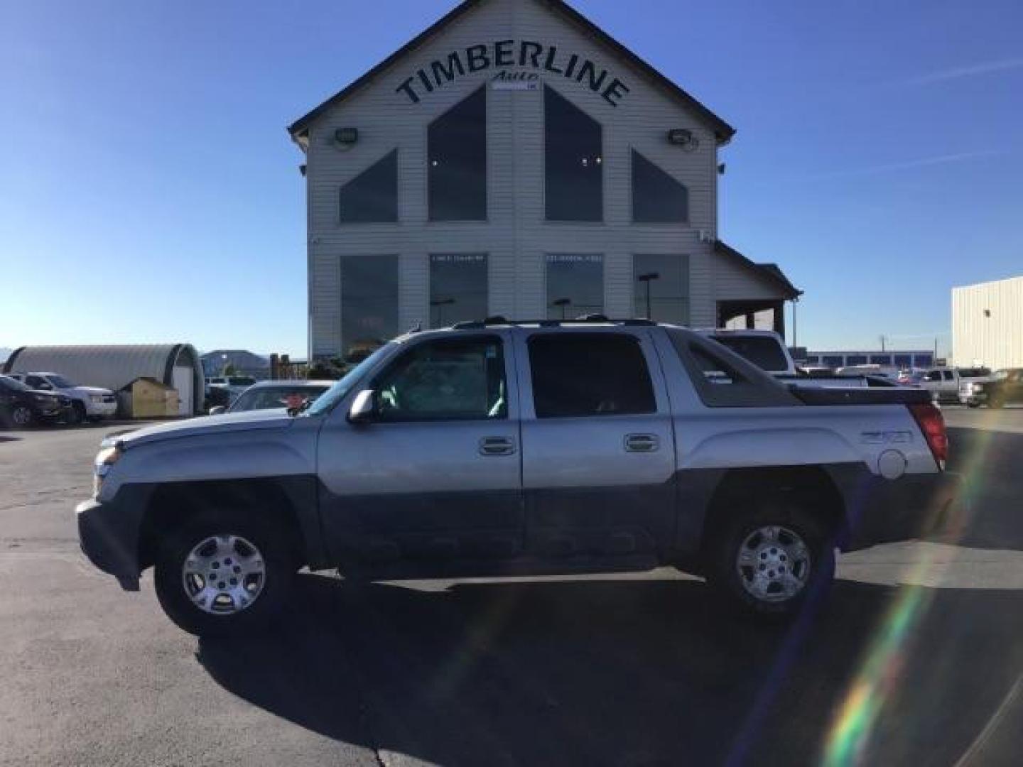 2004 Silver Birch Metallic /Dark Charcoal Cloth Interior Chevrolet Avalanche 1500 4WD (3GNEK12TX4G) with an 5.3L V8 OHV 16V engine, 4-Speed Automatic transmission, located at 1235 N Woodruff Ave., Idaho Falls, 83401, (208) 523-1053, 43.507172, -112.000488 - This 2004 Chevrolet Avalanche LTZ is Fully loaded. At Timberline Auto it is always easy to find a great deal on your next vehicle! Our experienced sales staff can help find the right vehicle will fit your needs. Our knowledgeable finance department has options for almost any credit score. We offer m - Photo#1