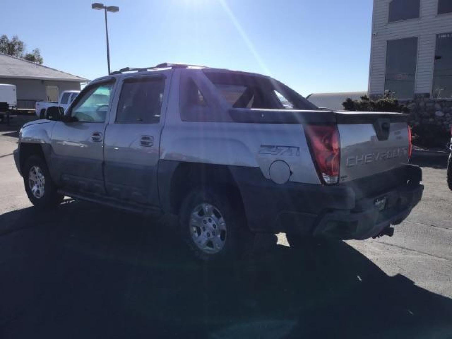 2004 Silver Birch Metallic /Dark Charcoal Cloth Interior Chevrolet Avalanche 1500 4WD (3GNEK12TX4G) with an 5.3L V8 OHV 16V engine, 4-Speed Automatic transmission, located at 1235 N Woodruff Ave., Idaho Falls, 83401, (208) 523-1053, 43.507172, -112.000488 - This 2004 Chevrolet Avalanche LTZ is Fully loaded. At Timberline Auto it is always easy to find a great deal on your next vehicle! Our experienced sales staff can help find the right vehicle will fit your needs. Our knowledgeable finance department has options for almost any credit score. We offer m - Photo#2