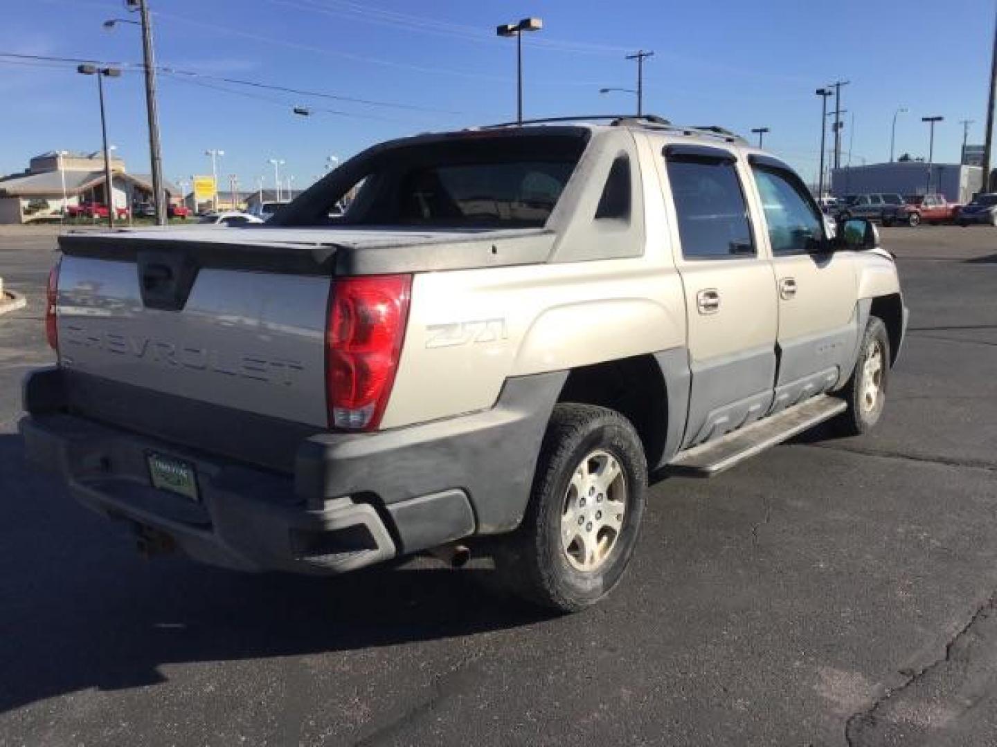 2004 Silver Birch Metallic /Dark Charcoal Cloth Interior Chevrolet Avalanche 1500 4WD (3GNEK12TX4G) with an 5.3L V8 OHV 16V engine, 4-Speed Automatic transmission, located at 1235 N Woodruff Ave., Idaho Falls, 83401, (208) 523-1053, 43.507172, -112.000488 - This 2004 Chevrolet Avalanche LTZ is Fully loaded. At Timberline Auto it is always easy to find a great deal on your next vehicle! Our experienced sales staff can help find the right vehicle will fit your needs. Our knowledgeable finance department has options for almost any credit score. We offer m - Photo#4