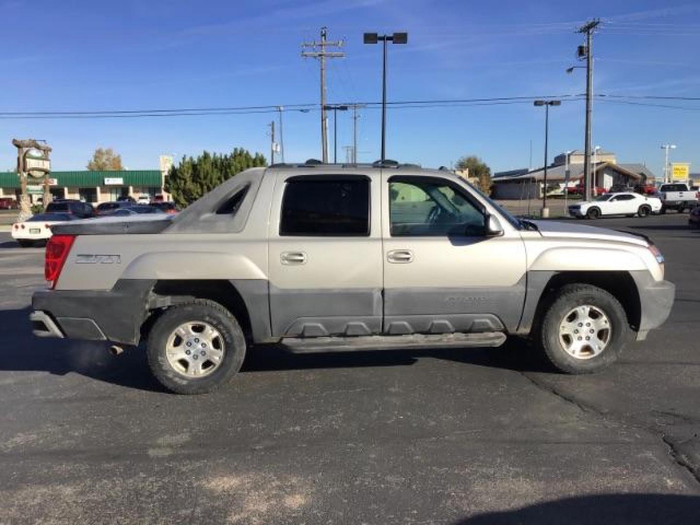 2004 Silver Birch Metallic /Dark Charcoal Cloth Interior Chevrolet Avalanche 1500 4WD (3GNEK12TX4G) with an 5.3L V8 OHV 16V engine, 4-Speed Automatic transmission, located at 1235 N Woodruff Ave., Idaho Falls, 83401, (208) 523-1053, 43.507172, -112.000488 - This 2004 Chevrolet Avalanche LTZ is Fully loaded. At Timberline Auto it is always easy to find a great deal on your next vehicle! Our experienced sales staff can help find the right vehicle will fit your needs. Our knowledgeable finance department has options for almost any credit score. We offer m - Photo#5