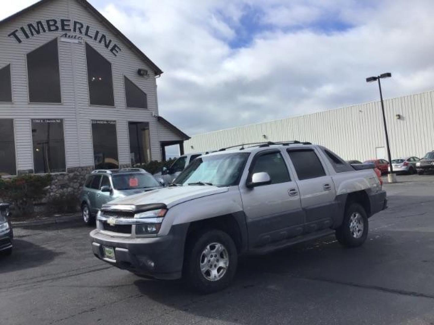 2004 Silver Birch Metallic /Dark Charcoal Cloth Interior Chevrolet Avalanche 1500 4WD (3GNEK12TX4G) with an 5.3L V8 OHV 16V engine, 4-Speed Automatic transmission, located at 1235 N Woodruff Ave., Idaho Falls, 83401, (208) 523-1053, 43.507172, -112.000488 - This 2004 Chevrolet Avalanche LTZ is Fully loaded. At Timberline Auto it is always easy to find a great deal on your next vehicle! Our experienced sales staff can help find the right vehicle will fit your needs. Our knowledgeable finance department has options for almost any credit score. We offer m - Photo#26