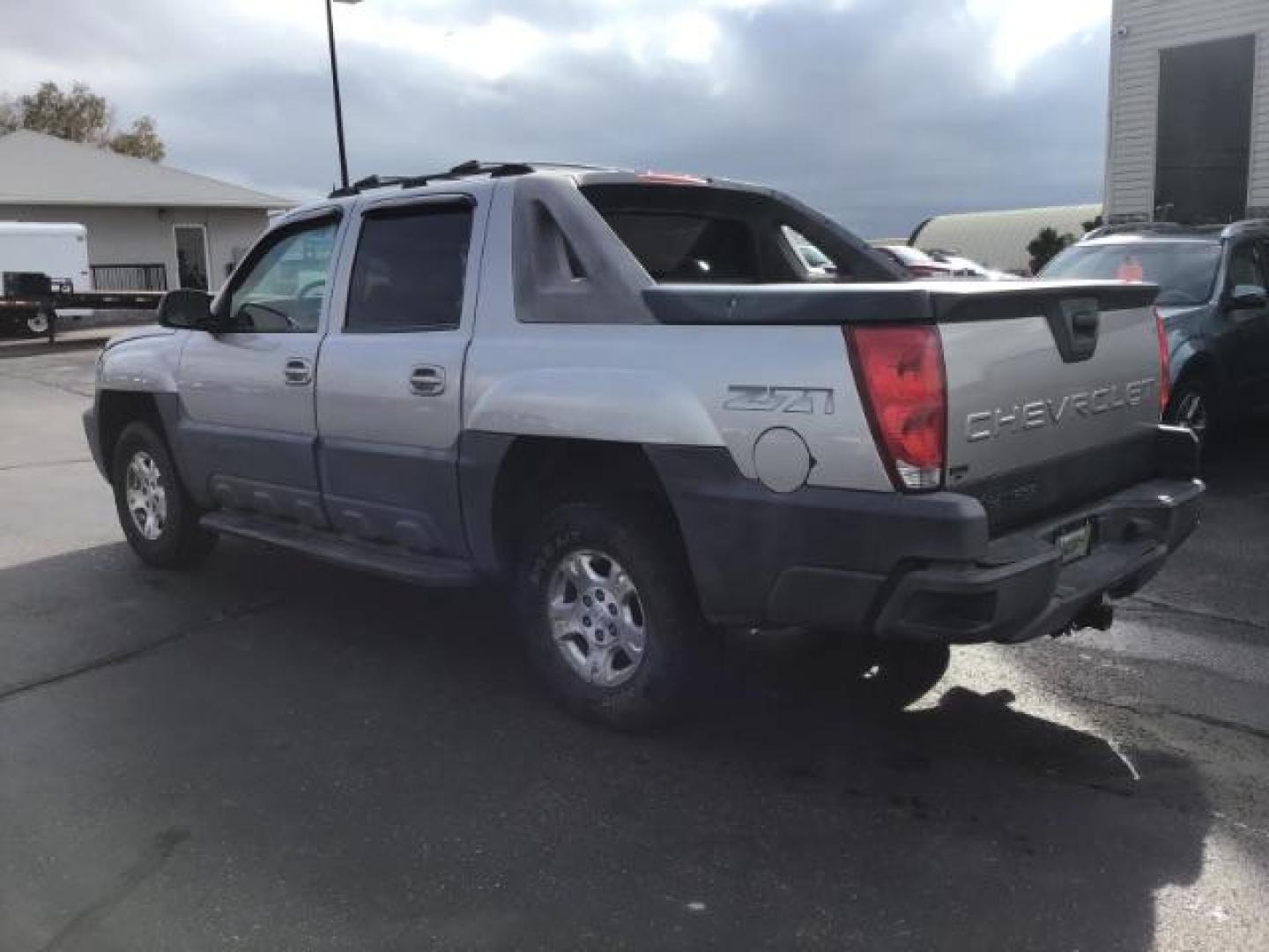 2004 Silver Birch Metallic /Dark Charcoal Cloth Interior Chevrolet Avalanche 1500 4WD (3GNEK12TX4G) with an 5.3L V8 OHV 16V engine, 4-Speed Automatic transmission, located at 1235 N Woodruff Ave., Idaho Falls, 83401, (208) 523-1053, 43.507172, -112.000488 - This 2004 Chevrolet Avalanche LTZ is Fully loaded. At Timberline Auto it is always easy to find a great deal on your next vehicle! Our experienced sales staff can help find the right vehicle will fit your needs. Our knowledgeable finance department has options for almost any credit score. We offer m - Photo#28