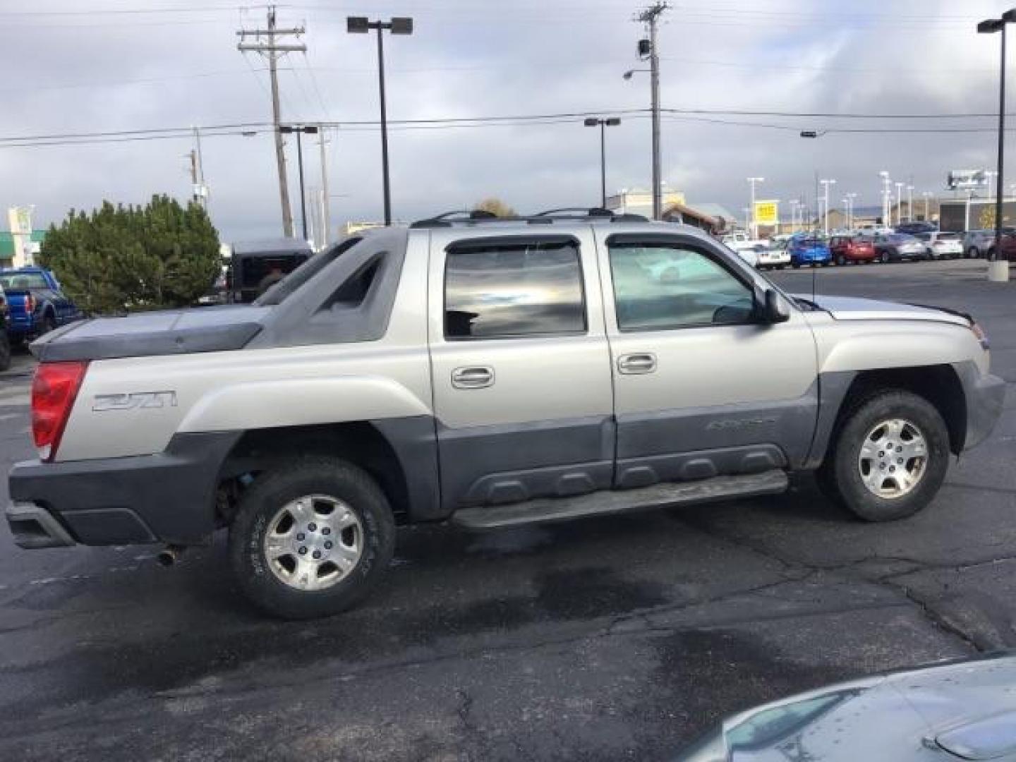 2004 Silver Birch Metallic /Dark Charcoal Cloth Interior Chevrolet Avalanche 1500 4WD (3GNEK12TX4G) with an 5.3L V8 OHV 16V engine, 4-Speed Automatic transmission, located at 1235 N Woodruff Ave., Idaho Falls, 83401, (208) 523-1053, 43.507172, -112.000488 - This 2004 Chevrolet Avalanche LTZ is Fully loaded. At Timberline Auto it is always easy to find a great deal on your next vehicle! Our experienced sales staff can help find the right vehicle will fit your needs. Our knowledgeable finance department has options for almost any credit score. We offer m - Photo#31