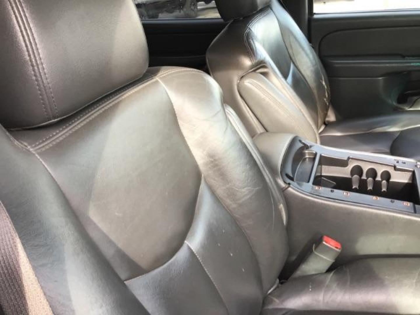 2004 Silver Birch Metallic /Dark Charcoal Cloth Interior Chevrolet Avalanche 1500 4WD (3GNEK12TX4G) with an 5.3L V8 OHV 16V engine, 4-Speed Automatic transmission, located at 1235 N Woodruff Ave., Idaho Falls, 83401, (208) 523-1053, 43.507172, -112.000488 - This 2004 Chevrolet Avalanche LTZ is Fully loaded. At Timberline Auto it is always easy to find a great deal on your next vehicle! Our experienced sales staff can help find the right vehicle will fit your needs. Our knowledgeable finance department has options for almost any credit score. We offer m - Photo#47