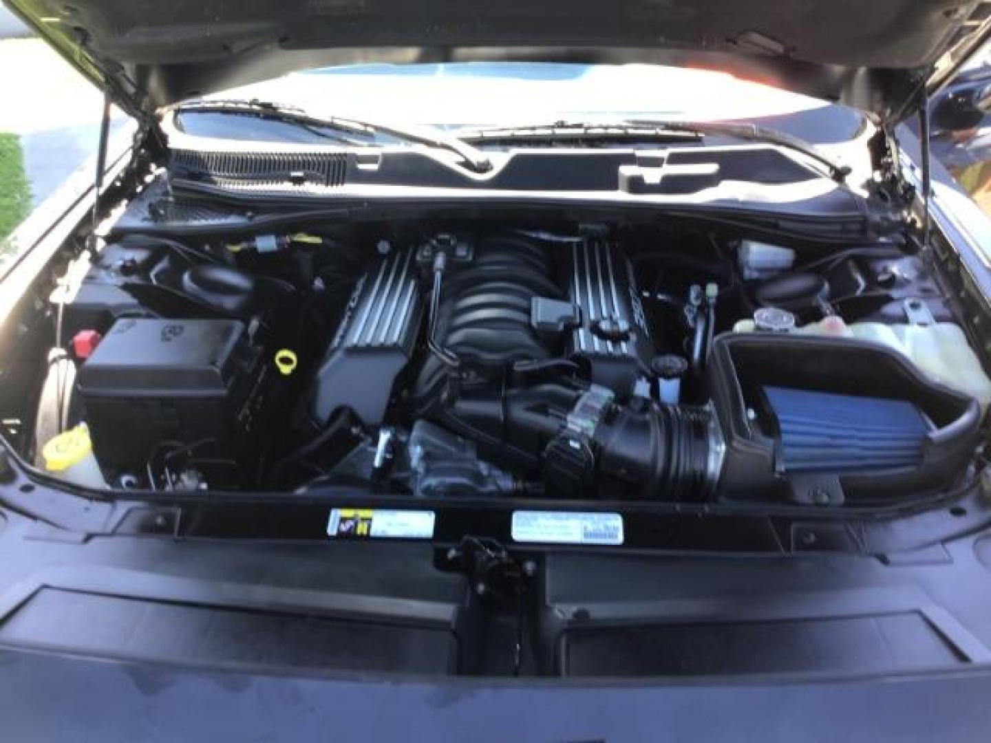 2014 Black Clearcoat /Radar Red/Dk Slate Gray Dodge Challenger SRT8 (2C3CDYCJ5EH) with an 6.4L V8 OHV 16V engine, 5-Speed Automatic transmission, located at 1235 N Woodruff Ave., Idaho Falls, 83401, (208) 523-1053, 43.507172, -112.000488 - SRT8, 392 Hemi, leather, automatic transmission,, heated seats, sunroof, multiple charge and USB ports, navigation, heated steering wheel, park assist, very low miles. At Timberline Auto it is always easy to find a great deal on your next vehicle! Our experienced sales staff can help find the right - Photo#14