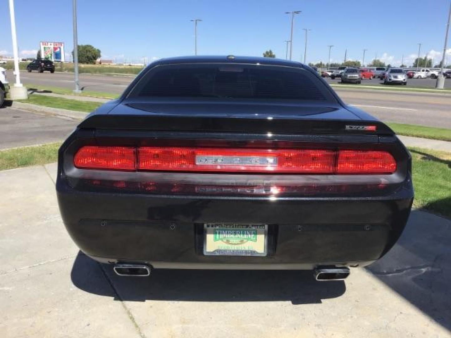 2014 Black Clearcoat /Radar Red/Dk Slate Gray Dodge Challenger SRT8 (2C3CDYCJ5EH) with an 6.4L V8 OHV 16V engine, 5-Speed Automatic transmission, located at 1235 N Woodruff Ave., Idaho Falls, 83401, (208) 523-1053, 43.507172, -112.000488 - SRT8, 392 Hemi, leather, automatic transmission,, heated seats, sunroof, multiple charge and USB ports, navigation, heated steering wheel, park assist, very low miles. At Timberline Auto it is always easy to find a great deal on your next vehicle! Our experienced sales staff can help find the right - Photo#3