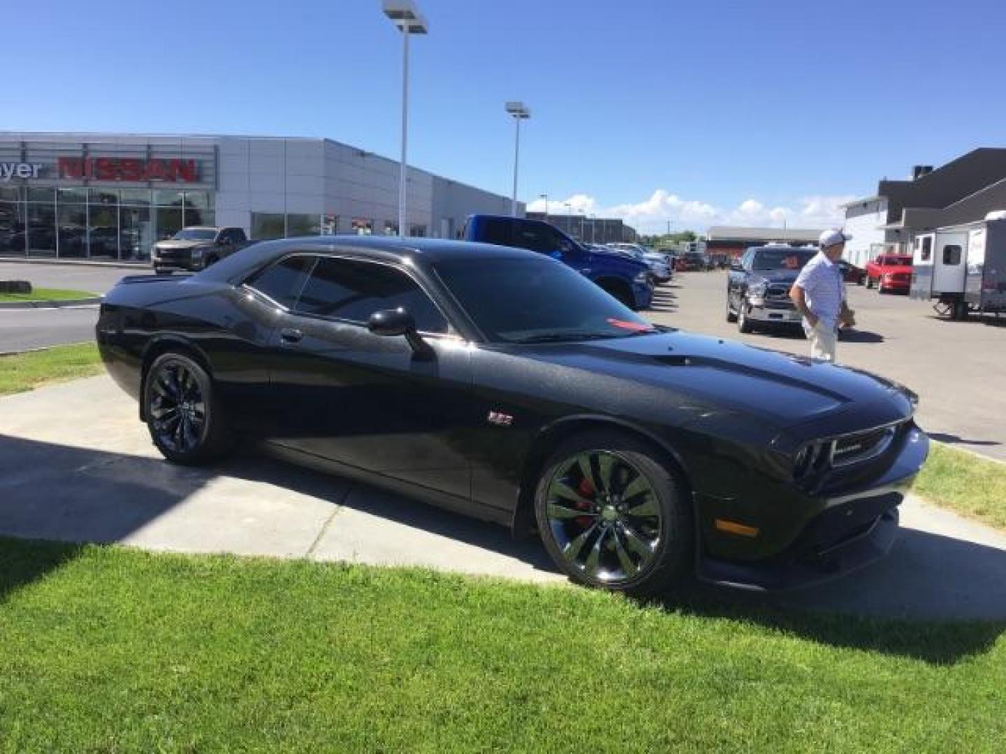 2014 Black Clearcoat /Radar Red/Dk Slate Gray Dodge Challenger SRT8 (2C3CDYCJ5EH) with an 6.4L V8 OHV 16V engine, 5-Speed Automatic transmission, located at 1235 N Woodruff Ave., Idaho Falls, 83401, (208) 523-1053, 43.507172, -112.000488 - SRT8, 392 Hemi, leather, automatic transmission,, heated seats, sunroof, multiple charge and USB ports, navigation, heated steering wheel, park assist, very low miles. At Timberline Auto it is always easy to find a great deal on your next vehicle! Our experienced sales staff can help find the right - Photo#6