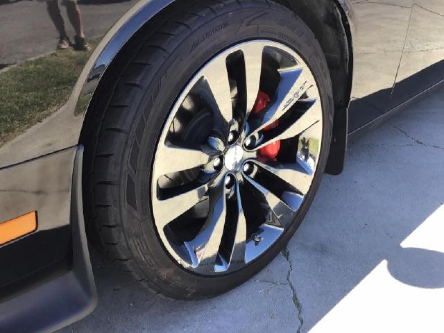 2014 Black Clearcoat /Radar Red/Dk Slate Gray Dodge Challenger SRT8 (2C3CDYCJ5EH) with an 6.4L V8 OHV 16V engine, 5-Speed Automatic transmission, located at 1235 N Woodruff Ave., Idaho Falls, 83401, (208) 523-1053, 43.507172, -112.000488 - SRT8, 392 Hemi, leather, automatic transmission,, heated seats, sunroof, multiple charge and USB ports, navigation, heated steering wheel, park assist, very low miles. At Timberline Auto it is always easy to find a great deal on your next vehicle! Our experienced sales staff can help find the right - Photo#8