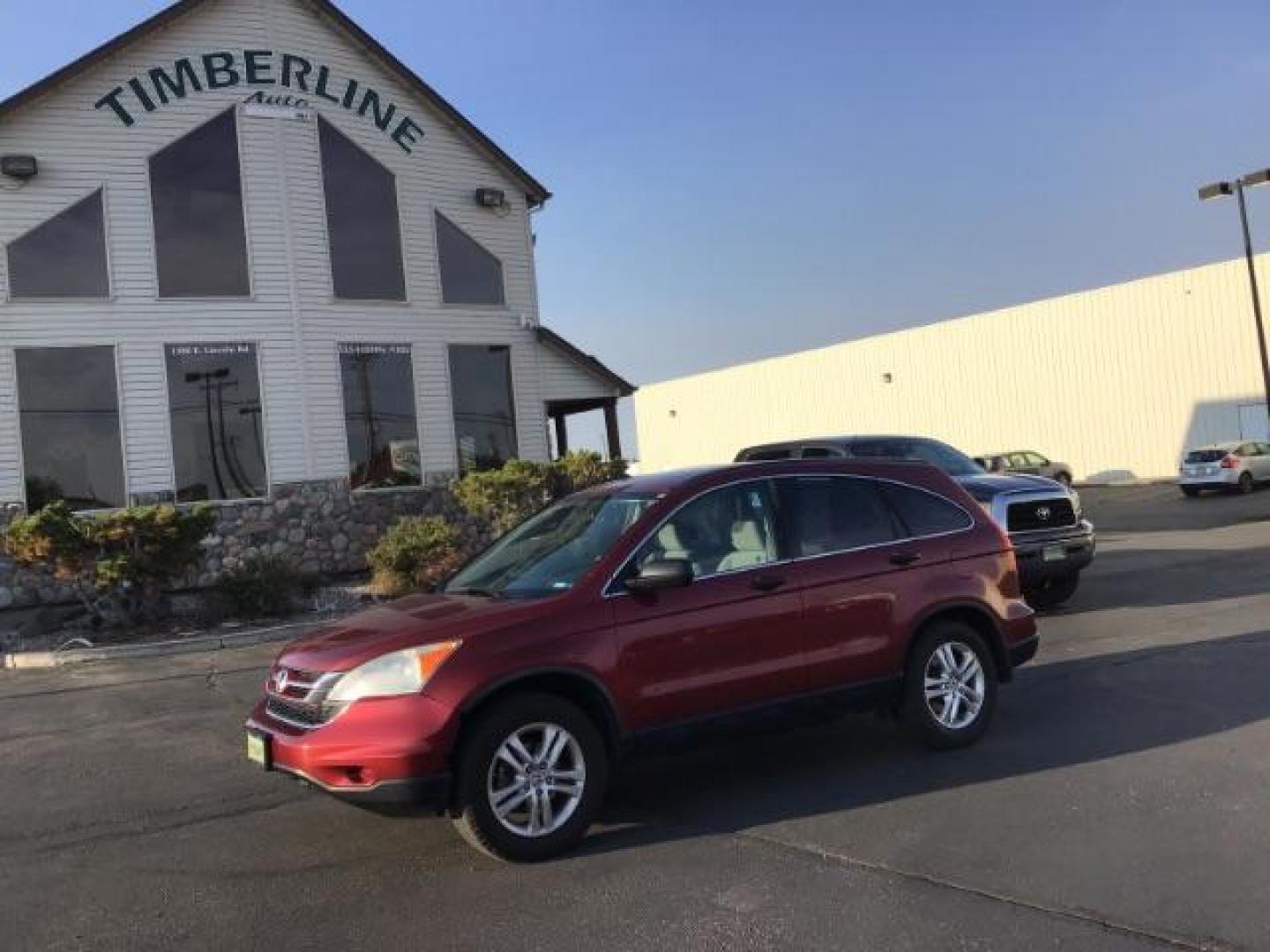 2011 Tango Red Pearl /Black Cloth Interior Honda CR-V EX 2WD 5-Speed AT (JHLRE3H59BC) with an 2.4L L4 DOHC 16V engine, 5-Speed Automatic transmission, located at 1235 N Woodruff Ave., Idaho Falls, 83401, (208) 523-1053, 43.507172, -112.000488 - At Timberline Auto it is always easy to find a great deal on your next vehicle! Our experienced sales staff can help find the right vehicle will fit your needs. Our knowledgeable finance department has options for almost any credit score. We offer many warranty contract options to protect you new pr - Photo#0