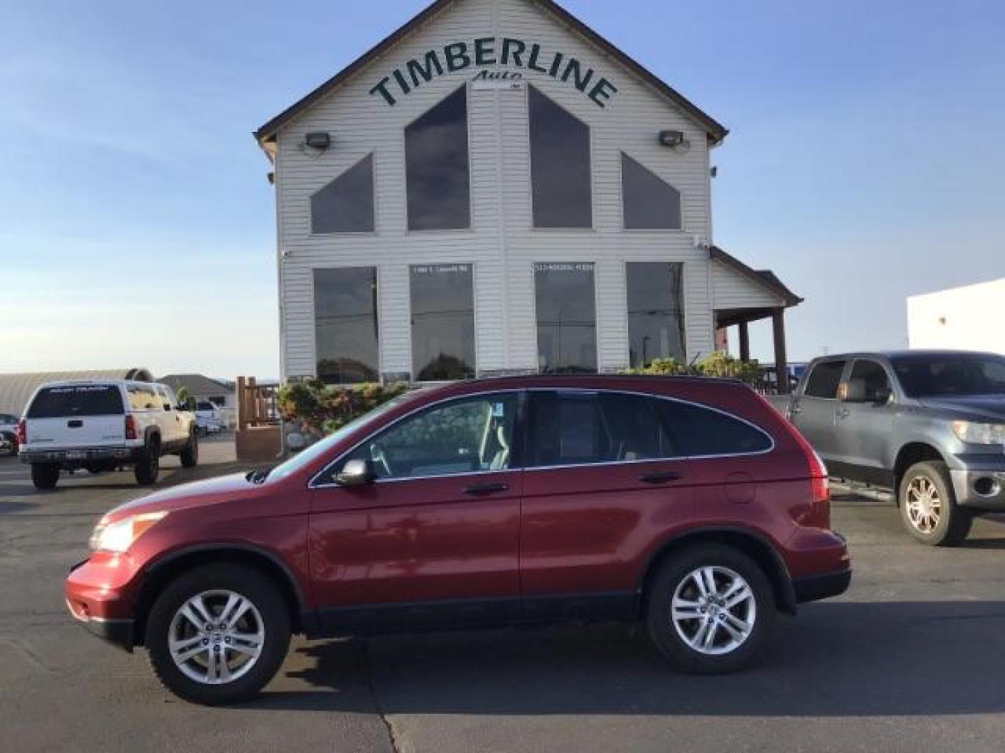 2011 Tango Red Pearl /Black Cloth Interior Honda CR-V EX 2WD 5-Speed AT (JHLRE3H59BC) with an 2.4L L4 DOHC 16V engine, 5-Speed Automatic transmission, located at 1235 N Woodruff Ave., Idaho Falls, 83401, (208) 523-1053, 43.507172, -112.000488 - At Timberline Auto it is always easy to find a great deal on your next vehicle! Our experienced sales staff can help find the right vehicle will fit your needs. Our knowledgeable finance department has options for almost any credit score. We offer many warranty contract options to protect you new pr - Photo#1