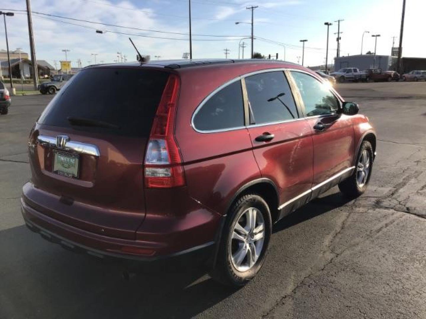 2011 Tango Red Pearl /Black Cloth Interior Honda CR-V EX 2WD 5-Speed AT (JHLRE3H59BC) with an 2.4L L4 DOHC 16V engine, 5-Speed Automatic transmission, located at 1235 N Woodruff Ave., Idaho Falls, 83401, (208) 523-1053, 43.507172, -112.000488 - At Timberline Auto it is always easy to find a great deal on your next vehicle! Our experienced sales staff can help find the right vehicle will fit your needs. Our knowledgeable finance department has options for almost any credit score. We offer many warranty contract options to protect you new pr - Photo#4