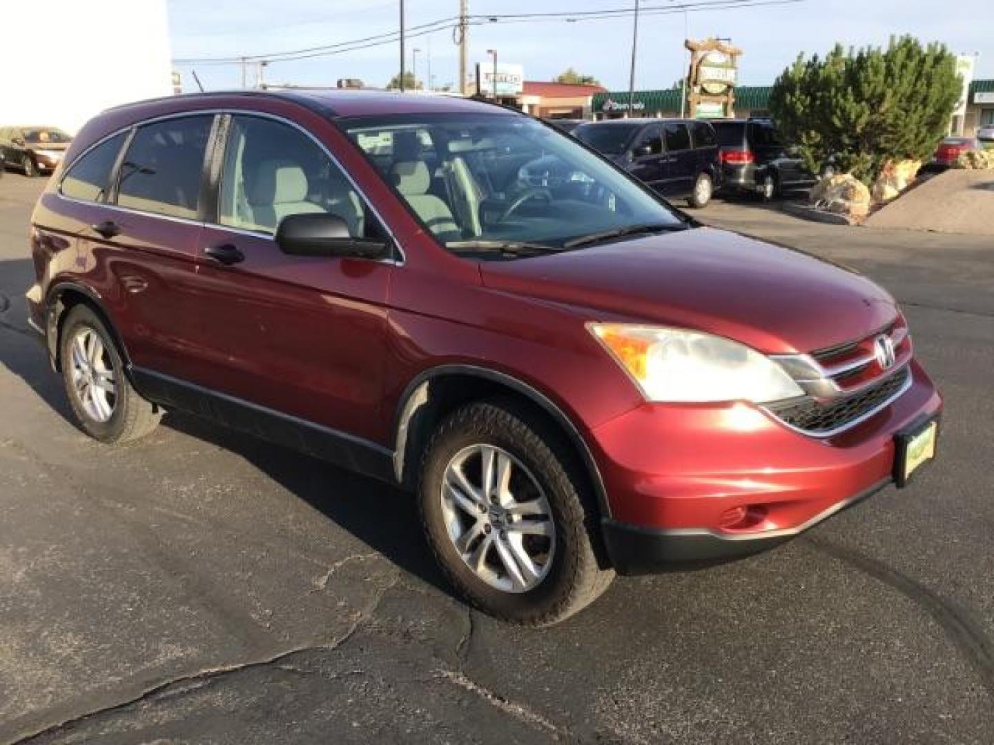 2011 Tango Red Pearl /Black Cloth Interior Honda CR-V EX 2WD 5-Speed AT (JHLRE3H59BC) with an 2.4L L4 DOHC 16V engine, 5-Speed Automatic transmission, located at 1235 N Woodruff Ave., Idaho Falls, 83401, (208) 523-1053, 43.507172, -112.000488 - At Timberline Auto it is always easy to find a great deal on your next vehicle! Our experienced sales staff can help find the right vehicle will fit your needs. Our knowledgeable finance department has options for almost any credit score. We offer many warranty contract options to protect you new pr - Photo#6