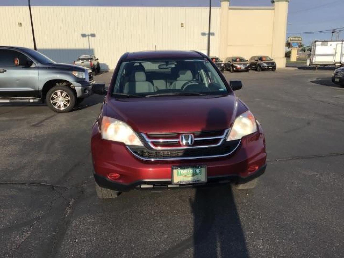 2011 Tango Red Pearl /Black Cloth Interior Honda CR-V EX 2WD 5-Speed AT (JHLRE3H59BC) with an 2.4L L4 DOHC 16V engine, 5-Speed Automatic transmission, located at 1235 N Woodruff Ave., Idaho Falls, 83401, (208) 523-1053, 43.507172, -112.000488 - At Timberline Auto it is always easy to find a great deal on your next vehicle! Our experienced sales staff can help find the right vehicle will fit your needs. Our knowledgeable finance department has options for almost any credit score. We offer many warranty contract options to protect you new pr - Photo#7