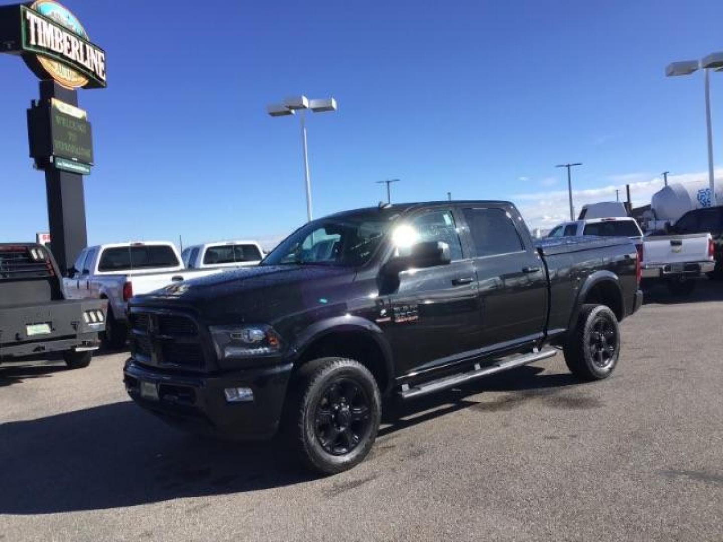 2016 BLACK /Black, leather RAM 2500 Laramie Crew Cab SWB 4WD (3C6UR5FL1GG) with an 6.7L L6 OHV 24V TURBO DIESEL engine, 6-Speed Automatic transmission, located at 1235 N Woodruff Ave., Idaho Falls, 83401, (208) 523-1053, 43.507172, -112.000488 - This Ram 2500 Laramie has the 6.7L diesel motor. It only has 107,233 miles. It is loaded up with options. Very nice truck At Timberline Auto it is always easy to find a great deal on your next vehicle! Our experienced sales staff can help find the right vehicle that will fit your needs. Our knowledg - Photo#0