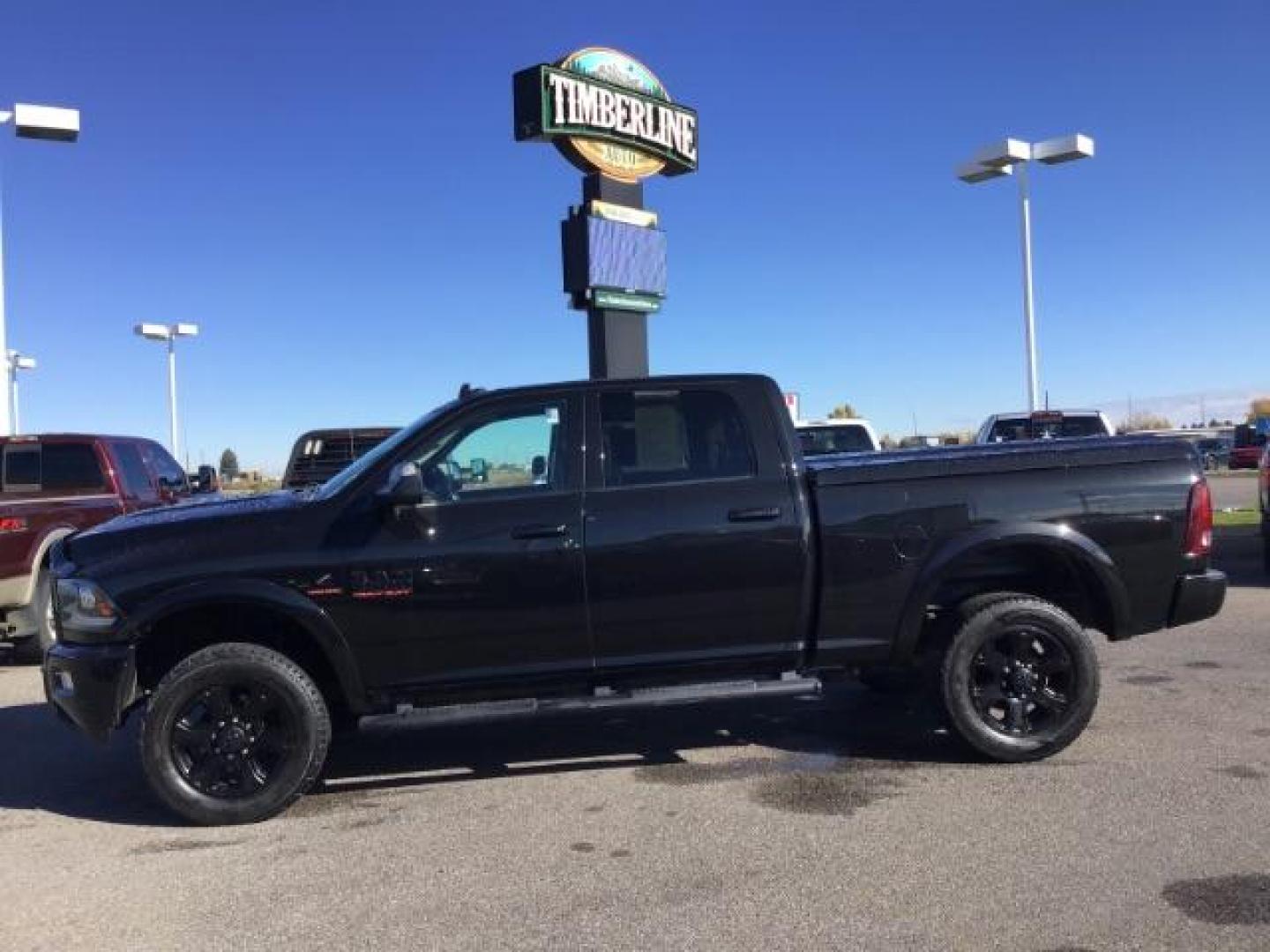 2016 BLACK /Black, leather RAM 2500 Laramie Crew Cab SWB 4WD (3C6UR5FL1GG) with an 6.7L L6 OHV 24V TURBO DIESEL engine, 6-Speed Automatic transmission, located at 1235 N Woodruff Ave., Idaho Falls, 83401, (208) 523-1053, 43.507172, -112.000488 - This Ram 2500 Laramie has the 6.7L diesel motor. It only has 107,233 miles. It is loaded up with options. Very nice truck At Timberline Auto it is always easy to find a great deal on your next vehicle! Our experienced sales staff can help find the right vehicle that will fit your needs. Our knowledg - Photo#1