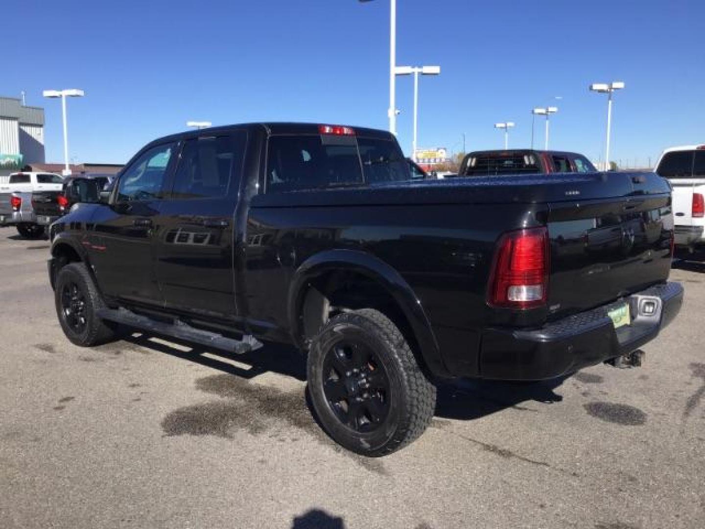 2016 BLACK /Black, leather RAM 2500 Laramie Crew Cab SWB 4WD (3C6UR5FL1GG) with an 6.7L L6 OHV 24V TURBO DIESEL engine, 6-Speed Automatic transmission, located at 1235 N Woodruff Ave., Idaho Falls, 83401, (208) 523-1053, 43.507172, -112.000488 - This Ram 2500 Laramie has the 6.7L diesel motor. It only has 107,233 miles. It is loaded up with options. Very nice truck At Timberline Auto it is always easy to find a great deal on your next vehicle! Our experienced sales staff can help find the right vehicle that will fit your needs. Our knowledg - Photo#2