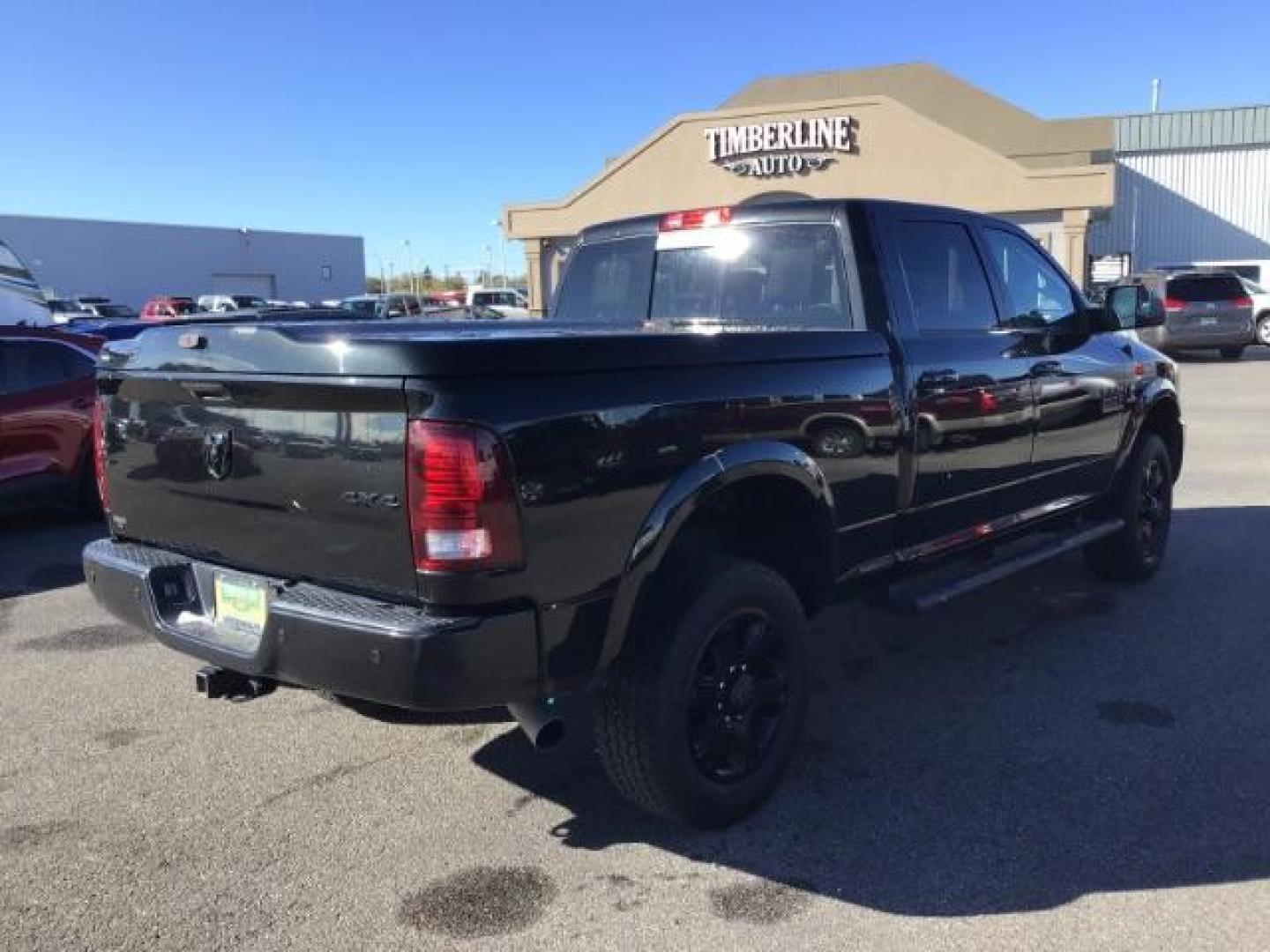 2016 BLACK /Black, leather RAM 2500 Laramie Crew Cab SWB 4WD (3C6UR5FL1GG) with an 6.7L L6 OHV 24V TURBO DIESEL engine, 6-Speed Automatic transmission, located at 1235 N Woodruff Ave., Idaho Falls, 83401, (208) 523-1053, 43.507172, -112.000488 - This Ram 2500 Laramie has the 6.7L diesel motor. It only has 107,233 miles. It is loaded up with options. Very nice truck At Timberline Auto it is always easy to find a great deal on your next vehicle! Our experienced sales staff can help find the right vehicle that will fit your needs. Our knowledg - Photo#4