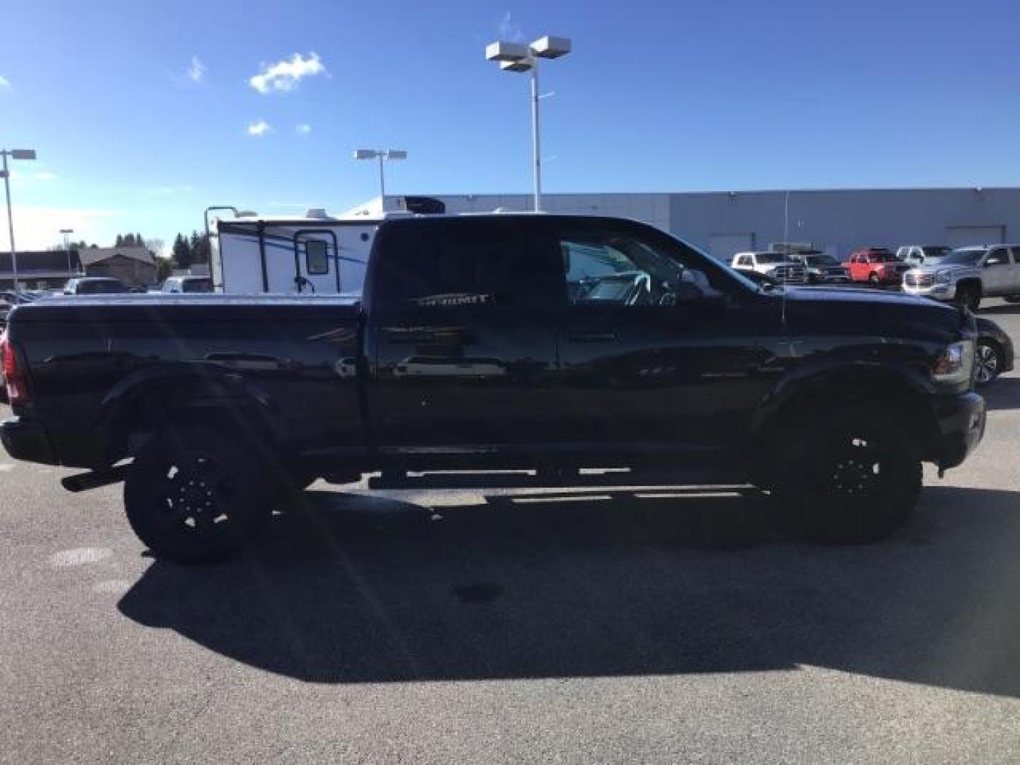 2016 BLACK /Black, leather RAM 2500 Laramie Crew Cab SWB 4WD (3C6UR5FL1GG) with an 6.7L L6 OHV 24V TURBO DIESEL engine, 6-Speed Automatic transmission, located at 1235 N Woodruff Ave., Idaho Falls, 83401, (208) 523-1053, 43.507172, -112.000488 - This Ram 2500 Laramie has the 6.7L diesel motor. It only has 107,233 miles. It is loaded up with options. Very nice truck At Timberline Auto it is always easy to find a great deal on your next vehicle! Our experienced sales staff can help find the right vehicle that will fit your needs. Our knowledg - Photo#5