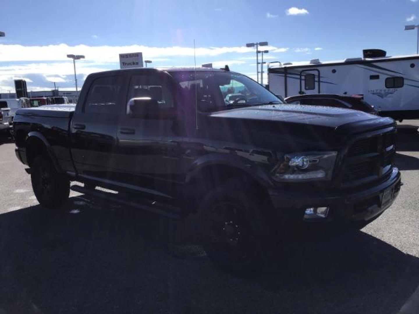 2016 BLACK /Black, leather RAM 2500 Laramie Crew Cab SWB 4WD (3C6UR5FL1GG) with an 6.7L L6 OHV 24V TURBO DIESEL engine, 6-Speed Automatic transmission, located at 1235 N Woodruff Ave., Idaho Falls, 83401, (208) 523-1053, 43.507172, -112.000488 - This Ram 2500 Laramie has the 6.7L diesel motor. It only has 107,233 miles. It is loaded up with options. Very nice truck At Timberline Auto it is always easy to find a great deal on your next vehicle! Our experienced sales staff can help find the right vehicle that will fit your needs. Our knowledg - Photo#6