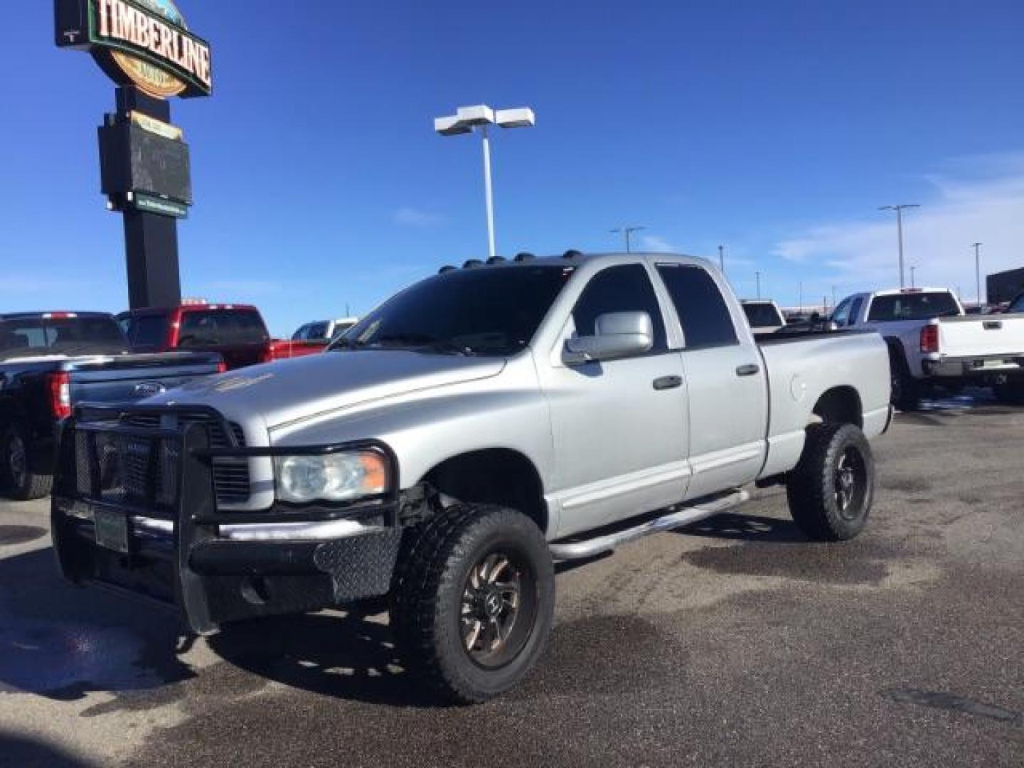 2004 SILVER /LARAMIE Dodge Ram 2500 Laramie Quad Cab 4WD (3D7KU28C44G) with an 5.9CUMMINS engine, MANUAL transmission, located at 1235 N Woodruff Ave., Idaho Falls, 83401, (208) 523-1053, 43.507172, -112.000488 - This is 2004 Dodge Ram 2500 Laramie, 4x4, 5.9L diesel motor. It has 139,000 miles. It is a manual transmission. Comes with leather interior, cruise control, heated seats, and powered seats. At Timberline Auto it is always easy to find a great deal on your next vehicle! Our experienced sales staff c - Photo#0