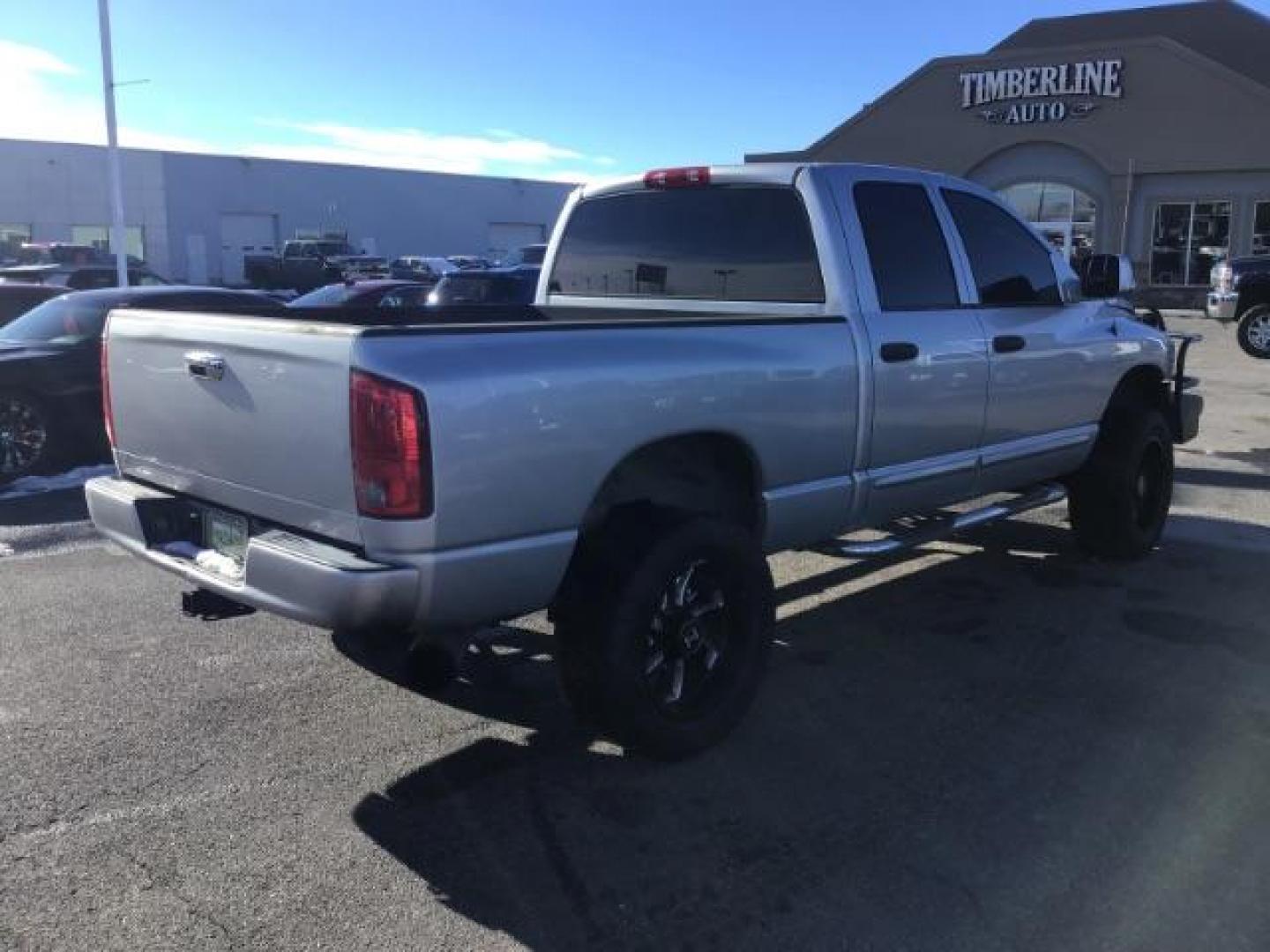 2004 SILVER /LARAMIE Dodge Ram 2500 Laramie Quad Cab 4WD (3D7KU28C44G) with an 5.9CUMMINS engine, MANUAL transmission, located at 1235 N Woodruff Ave., Idaho Falls, 83401, (208) 523-1053, 43.507172, -112.000488 - This is 2004 Dodge Ram 2500 Laramie, 4x4, 5.9L diesel motor. It has 139,000 miles. It is a manual transmission. Comes with leather interior, cruise control, heated seats, and powered seats. At Timberline Auto it is always easy to find a great deal on your next vehicle! Our experienced sales staff c - Photo#4