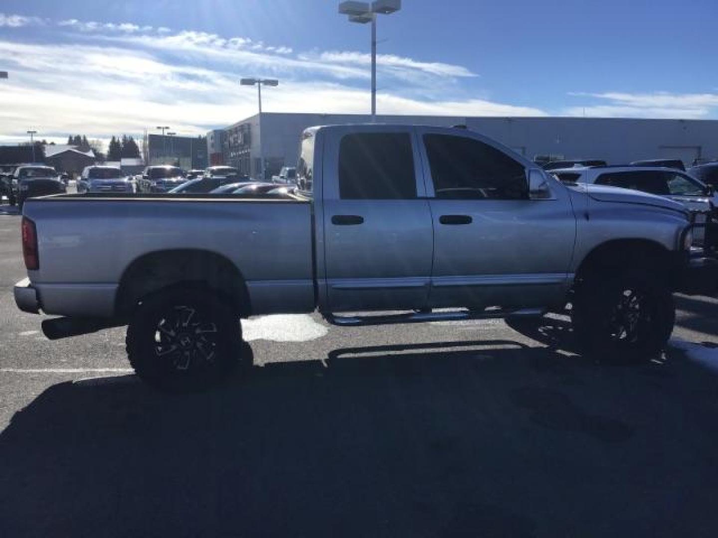 2004 SILVER /LARAMIE Dodge Ram 2500 Laramie Quad Cab 4WD (3D7KU28C44G) with an 5.9CUMMINS engine, MANUAL transmission, located at 1235 N Woodruff Ave., Idaho Falls, 83401, (208) 523-1053, 43.507172, -112.000488 - This is 2004 Dodge Ram 2500 Laramie, 4x4, 5.9L diesel motor. It has 139,000 miles. It is a manual transmission. Comes with leather interior, cruise control, heated seats, and powered seats. At Timberline Auto it is always easy to find a great deal on your next vehicle! Our experienced sales staff c - Photo#5