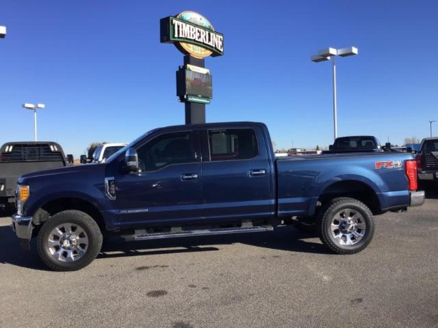 2017 BLUE /BLACK Ford F-350 SD Lariat Crew Cab 4WD (1FT8W3BTXHE) with an 6.7POWERSTROKE engine, AUTOMATIC transmission, located at 1235 N Woodruff Ave., Idaho Falls, 83401, (208) 523-1053, 43.507172, -112.000488 - This 2017 Ford F350 Lariat, has the 6.7L diesel motor. It has 128,200 miles. It is loaded. It has a spray in bed liner, heated and cooled seats, leather interior, sun roof navigation system, running boards, and tinted glass. At Timberline Auto it is always easy to find a great deal on your next vehi - Photo#1