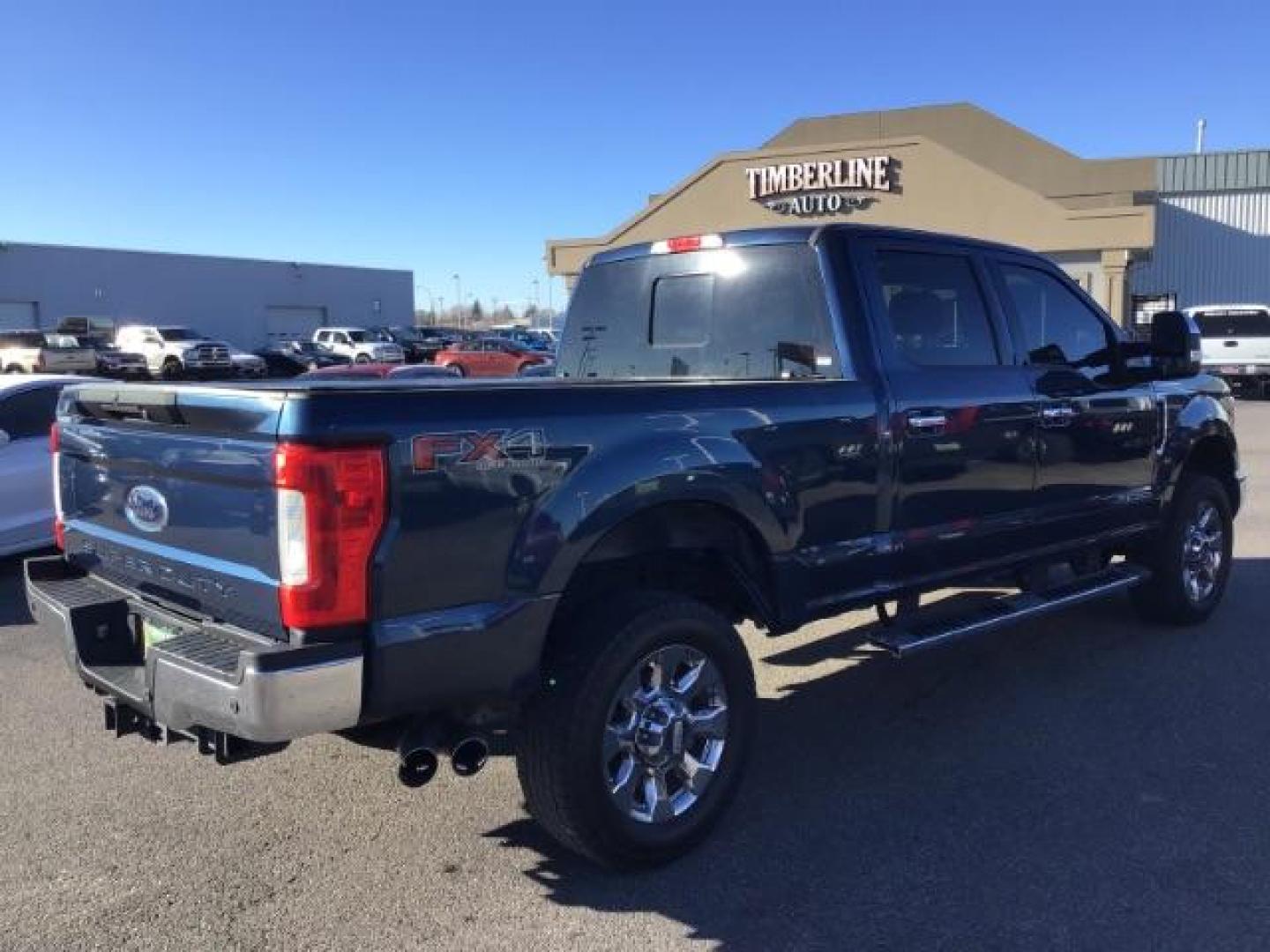 2017 BLUE /BLACK Ford F-350 SD Lariat Crew Cab 4WD (1FT8W3BTXHE) with an 6.7POWERSTROKE engine, AUTOMATIC transmission, located at 1235 N Woodruff Ave., Idaho Falls, 83401, (208) 523-1053, 43.507172, -112.000488 - This 2017 Ford F350 Lariat, has the 6.7L diesel motor. It has 128,200 miles. It is loaded. It has a spray in bed liner, heated and cooled seats, leather interior, sun roof navigation system, running boards, and tinted glass. At Timberline Auto it is always easy to find a great deal on your next vehi - Photo#4