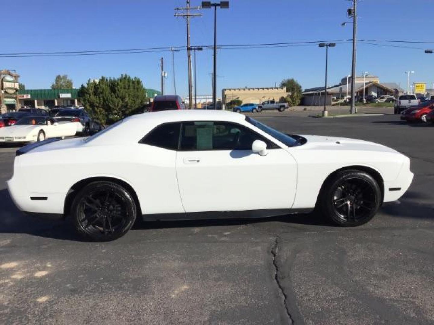 2010 Stone White /Dark Slate Gray Cloth Interior Dodge Challenger R/T (2B3CJ5DT5AH) with an 5.7L V8 OHV 16V engine, 4-Speed Automatic transmission, located at 1235 N Woodruff Ave., Idaho Falls, 83401, (208) 523-1053, 43.507172, -112.000488 - At Timberline Auto it is always easy to find a great deal on your next vehicle! Our experienced sales staff can help find the right vehicle will fit your needs. Our knowledgeable finance department has options for almost any credit score. We offer many warranty contract options to protect you new pr - Photo#4