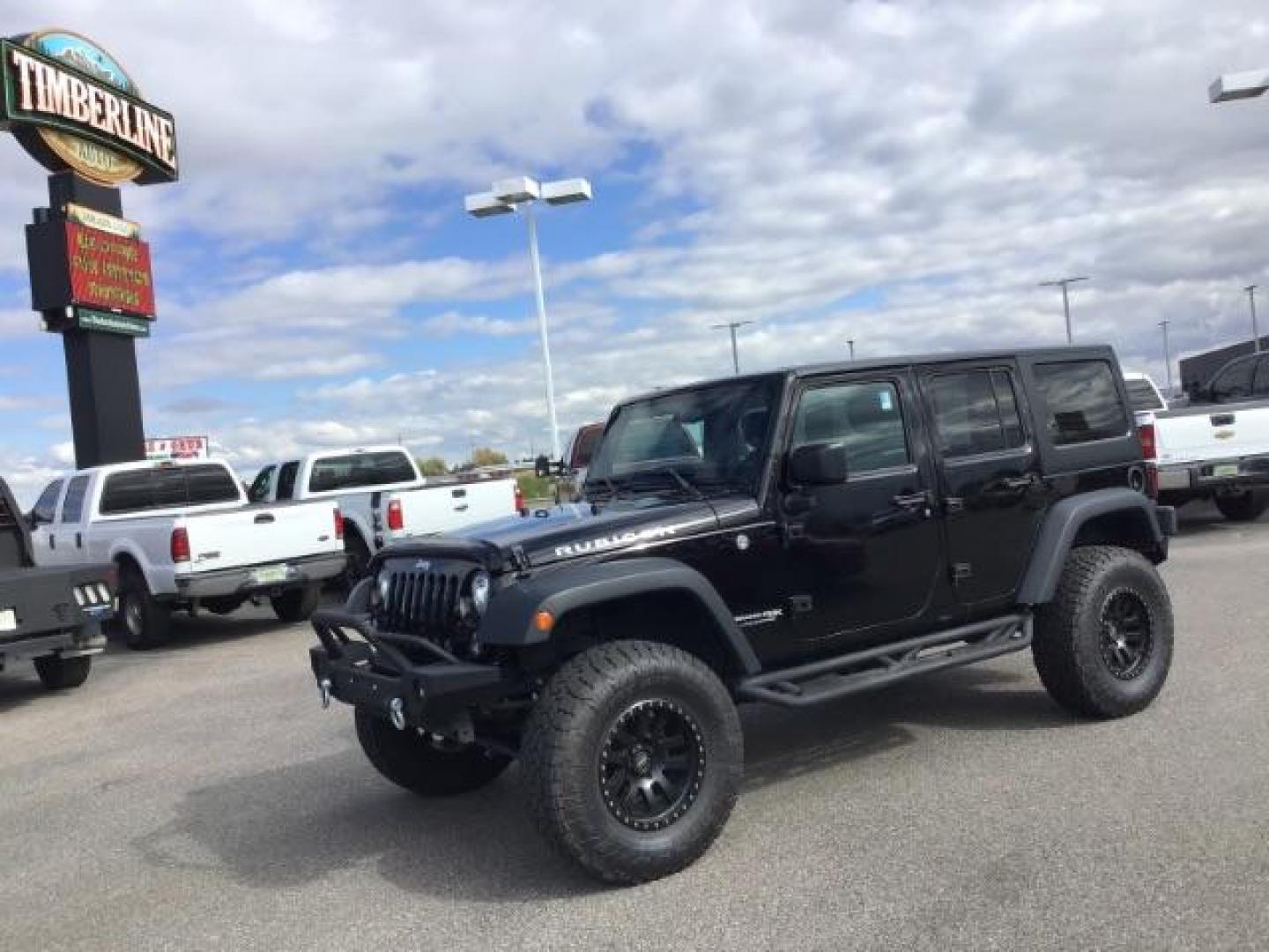 2018 Black Clear Coat /Black, leather Jeep Wrangler JK Unlimited Rubicon 4WD (1C4BJWFG1JL) with an 3.6L V6 DOHC 24V FFV engine, 6-Speed Automatic transmission, located at 1235 N Woodruff Ave., Idaho Falls, 83401, (208) 523-1053, 43.507172, -112.000488 - This 2018 Jeep Wrangler Unlimited Rubicon, has the 3.6L V6 motor. It only has 40,552 miles. It comes with Keyless remote, Heated Seats, power windows, back up camera, and bluetooth capabilities. At Timberline Auto it is always easy to find a great deal on your next vehicle! Our experienced sales st - Photo#0