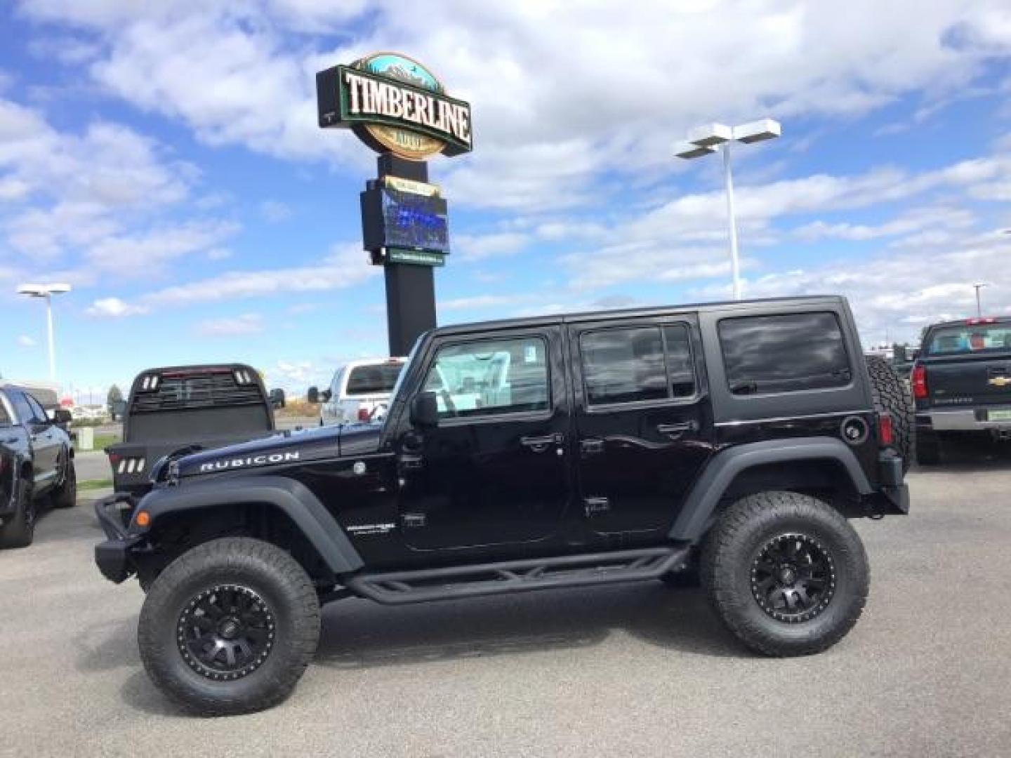 2018 Black Clear Coat /Black, leather Jeep Wrangler JK Unlimited Rubicon 4WD (1C4BJWFG1JL) with an 3.6L V6 DOHC 24V FFV engine, 6-Speed Automatic transmission, located at 1235 N Woodruff Ave., Idaho Falls, 83401, (208) 523-1053, 43.507172, -112.000488 - This 2018 Jeep Wrangler Unlimited Rubicon, has the 3.6L V6 motor. It only has 40,552 miles. It comes with Keyless remote, Heated Seats, power windows, back up camera, and bluetooth capabilities. At Timberline Auto it is always easy to find a great deal on your next vehicle! Our experienced sales st - Photo#1