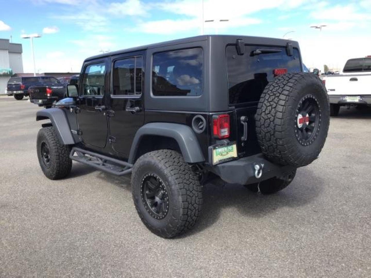 2018 Black Clear Coat /Black, leather Jeep Wrangler JK Unlimited Rubicon 4WD (1C4BJWFG1JL) with an 3.6L V6 DOHC 24V FFV engine, 6-Speed Automatic transmission, located at 1235 N Woodruff Ave., Idaho Falls, 83401, (208) 523-1053, 43.507172, -112.000488 - This 2018 Jeep Wrangler Unlimited Rubicon, has the 3.6L V6 motor. It only has 40,552 miles. It comes with Keyless remote, Heated Seats, power windows, back up camera, and bluetooth capabilities. At Timberline Auto it is always easy to find a great deal on your next vehicle! Our experienced sales st - Photo#2