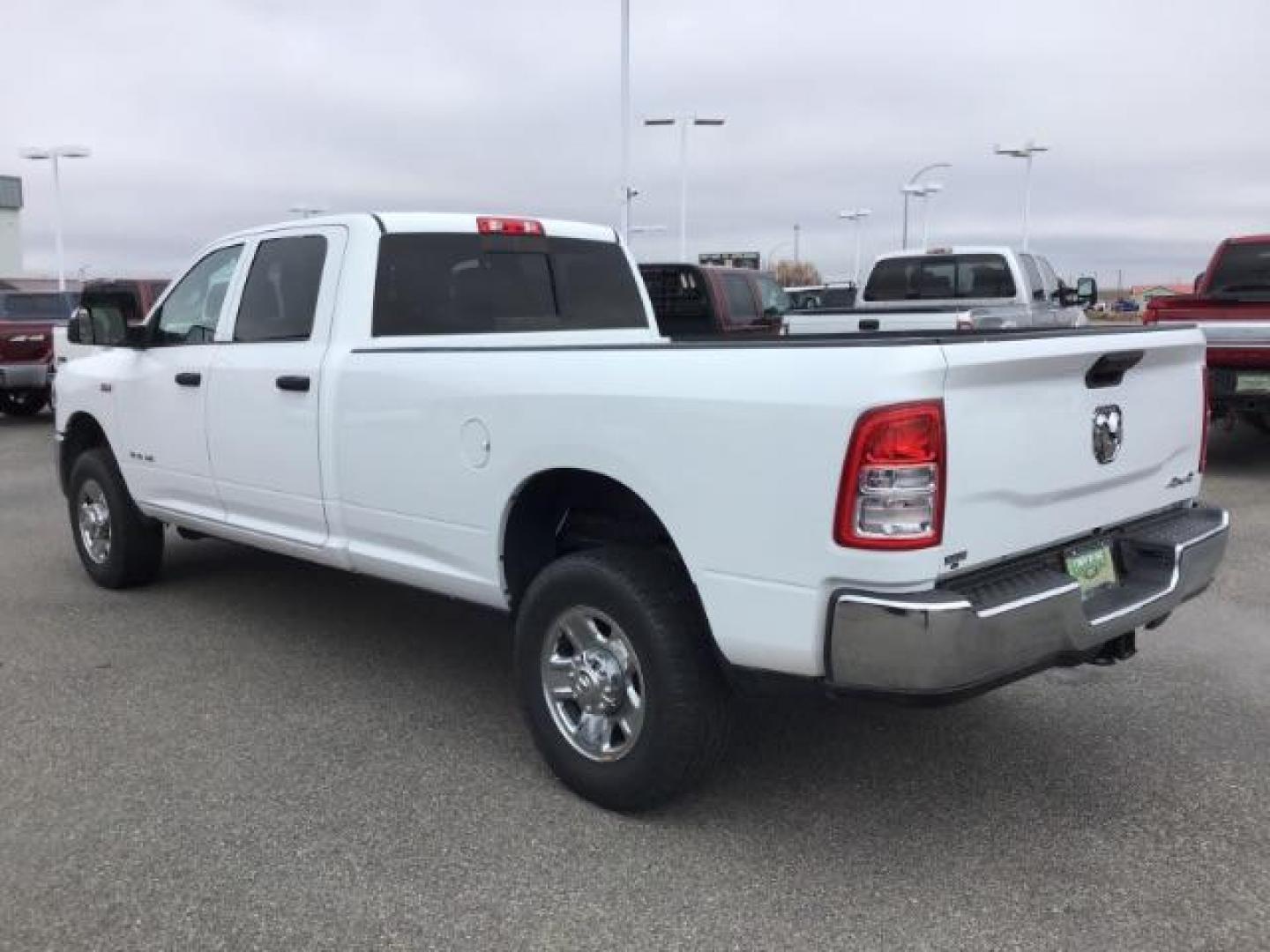 2021 Bright White Clear Coat /Black/Diesel Gray RAM 2500 Tradesman Crew Cab LWB 4WD (3C6UR5HJ9MG) with an 6.4L V8 engine, 6-Speed Automatic transmission, located at 1235 N Woodruff Ave., Idaho Falls, 83401, (208) 523-1053, 43.507172, -112.000488 - This 2021 Ram 2500 Tradesmen, has the 6.4L V8 motor. It has 52,634 miles. Comes with cloth interior, back up camera, keyless remote, and bluetooth. At Timberline Auto it is always easy to find a great deal on your next vehicle! Our experienced sales staff can help find the right vehicle that will fi - Photo#2