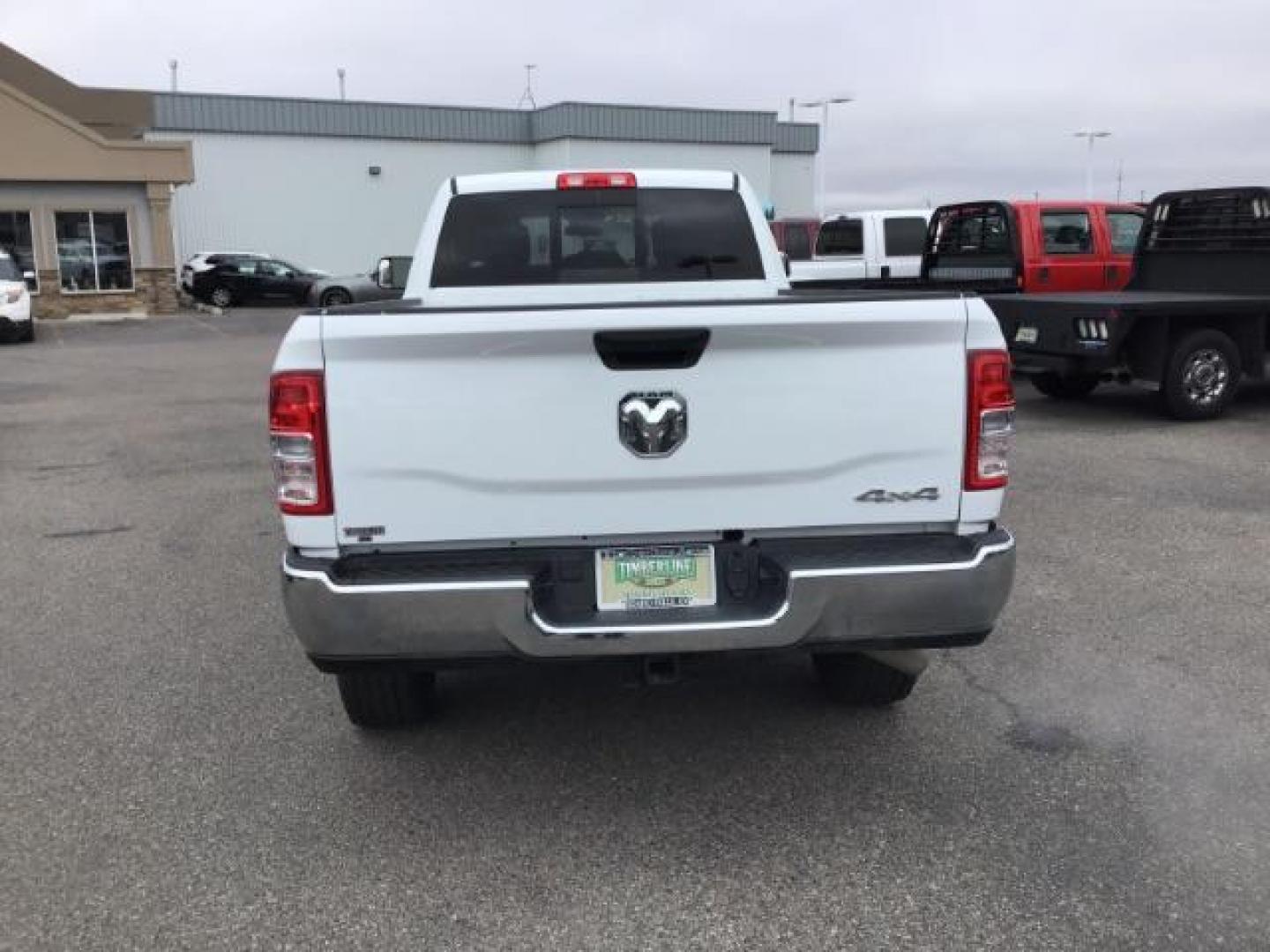 2021 Bright White Clear Coat /Black/Diesel Gray RAM 2500 Tradesman Crew Cab LWB 4WD (3C6UR5HJ9MG) with an 6.4L V8 engine, 6-Speed Automatic transmission, located at 1235 N Woodruff Ave., Idaho Falls, 83401, (208) 523-1053, 43.507172, -112.000488 - This 2021 Ram 2500 Tradesmen, has the 6.4L V8 motor. It has 52,634 miles. Comes with cloth interior, back up camera, keyless remote, and bluetooth. At Timberline Auto it is always easy to find a great deal on your next vehicle! Our experienced sales staff can help find the right vehicle that will fi - Photo#3