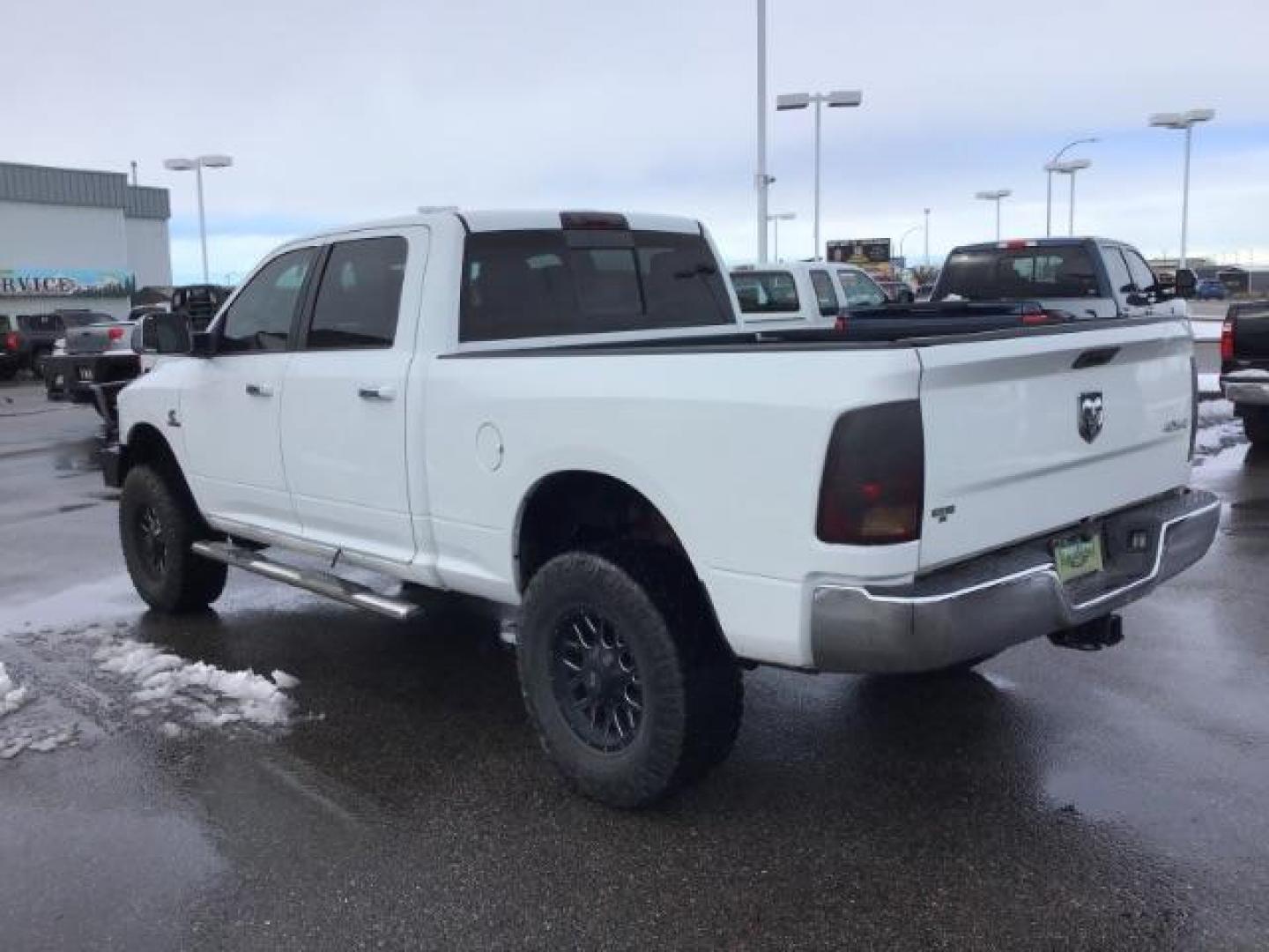 2013 Bright White Clearcoat /Diesel Gray/Black RAM 2500 SLT Crew Cab SWB 4WD (3C6UR5DL9DG) with an 6.7L L6 OHV 24V TURBO DIESEL engine, 6-Speed Automatic transmission, located at 1235 N Woodruff Ave., Idaho Falls, 83401, (208) 523-1053, 43.507172, -112.000488 - This 2013 Ram 2500 SLT 4x4, has the 6.7l diesel motor. It has 196,000 miles. It comes with cloth interior, back up camera, blue tooth audio, spray in bed liner, power mirrors, and power windows. At Timberline Auto it is always easy to find a great deal on your next vehicle! Our experienced sales sta - Photo#2