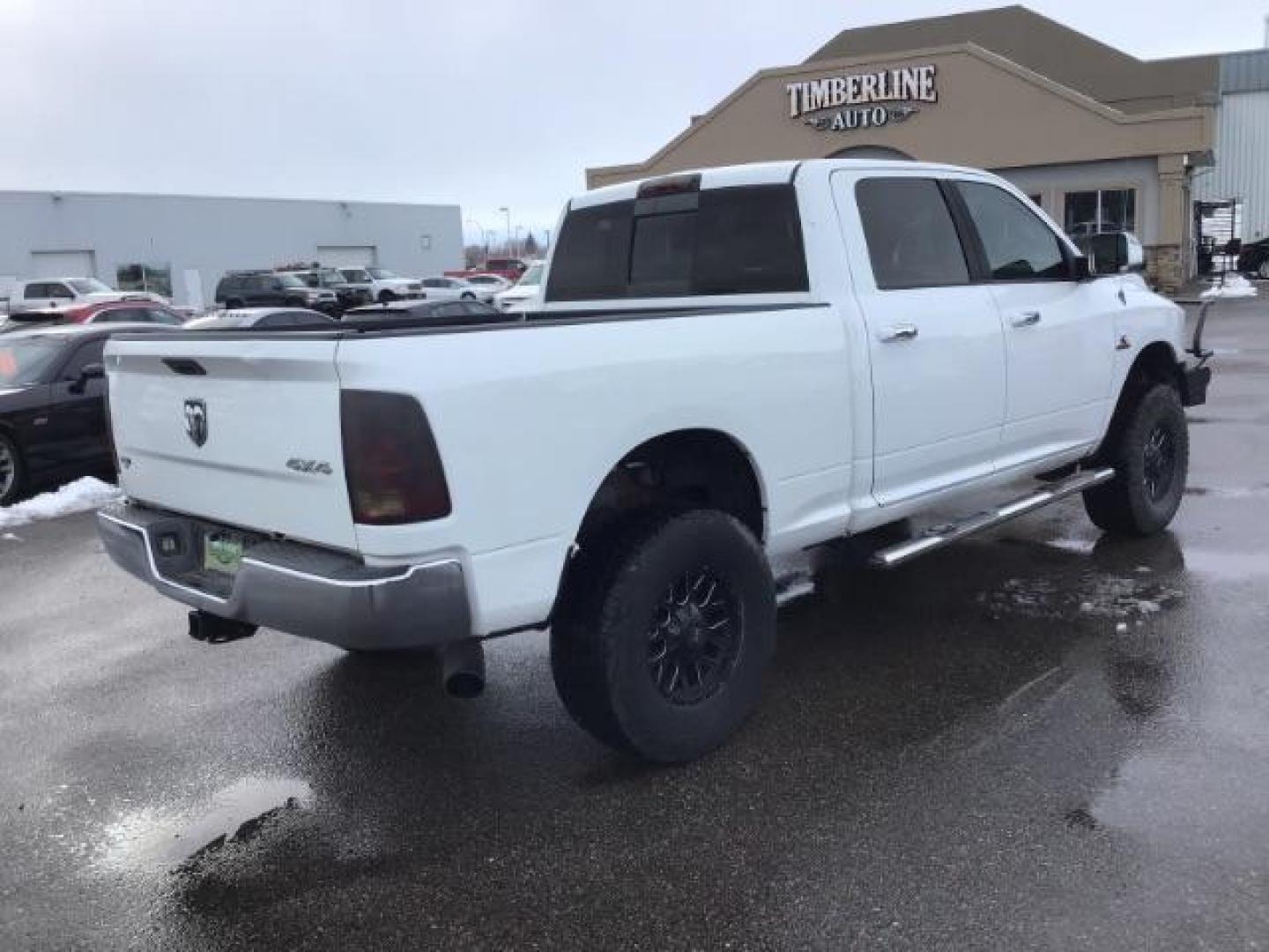 2013 Bright White Clearcoat /Diesel Gray/Black RAM 2500 SLT Crew Cab SWB 4WD (3C6UR5DL9DG) with an 6.7L L6 OHV 24V TURBO DIESEL engine, 6-Speed Automatic transmission, located at 1235 N Woodruff Ave., Idaho Falls, 83401, (208) 523-1053, 43.507172, -112.000488 - This 2013 Ram 2500 SLT 4x4, has the 6.7l diesel motor. It has 196,000 miles. It comes with cloth interior, back up camera, blue tooth audio, spray in bed liner, power mirrors, and power windows. At Timberline Auto it is always easy to find a great deal on your next vehicle! Our experienced sales sta - Photo#4