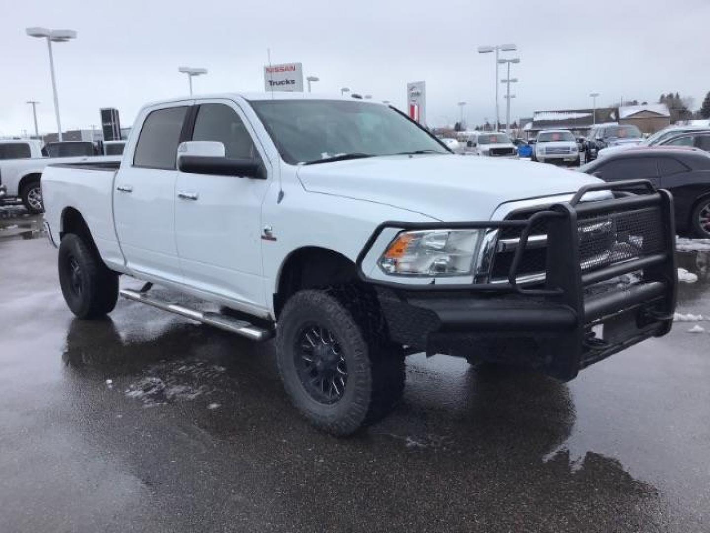 2013 Bright White Clearcoat /Diesel Gray/Black RAM 2500 SLT Crew Cab SWB 4WD (3C6UR5DL9DG) with an 6.7L L6 OHV 24V TURBO DIESEL engine, 6-Speed Automatic transmission, located at 1235 N Woodruff Ave., Idaho Falls, 83401, (208) 523-1053, 43.507172, -112.000488 - This 2013 Ram 2500 SLT 4x4, has the 6.7l diesel motor. It has 196,000 miles. It comes with cloth interior, back up camera, blue tooth audio, spray in bed liner, power mirrors, and power windows. At Timberline Auto it is always easy to find a great deal on your next vehicle! Our experienced sales sta - Photo#6