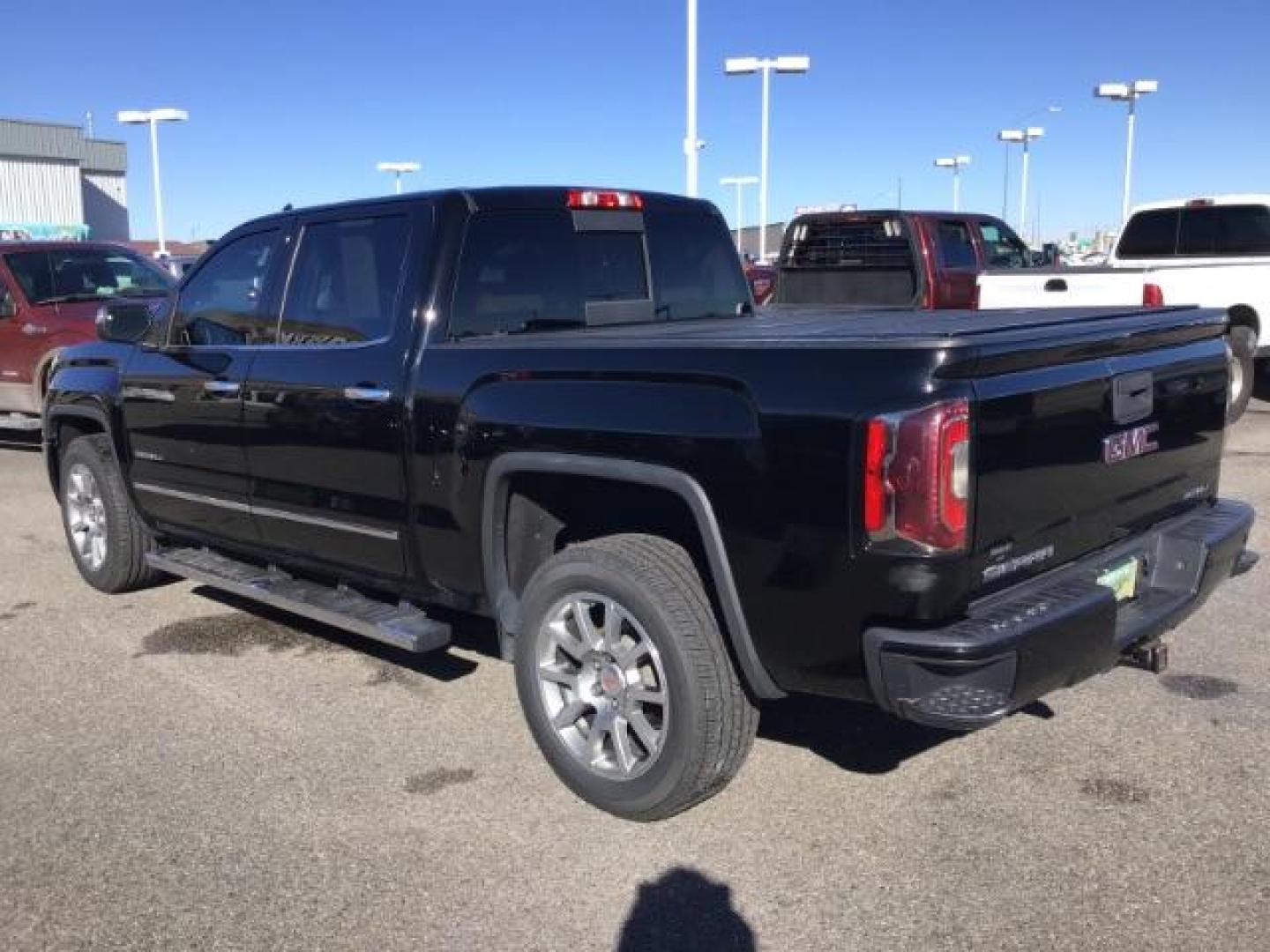 2018 Onyx Black /Cocoa/Dark Sand, leather GMC Sierra 1500 Denali Crew Cab Short Box 4WD (3GTU2PEJ0JG) with an 6.2L V8 OHV 16V engine, 6-Speed Automatic transmission, located at 1235 N Woodruff Ave., Idaho Falls, 83401, (208) 523-1053, 43.507172, -112.000488 - This 2018 GMC 1500 Denali has the 6.2L motor. It has 84,620. This is a really nice truck, that is loaded up with options. At Timberline Auto it is always easy to find a great deal on your next vehicle! Our experienced sales staff can help find the right vehicle that will fit your needs. Our knowledg - Photo#2