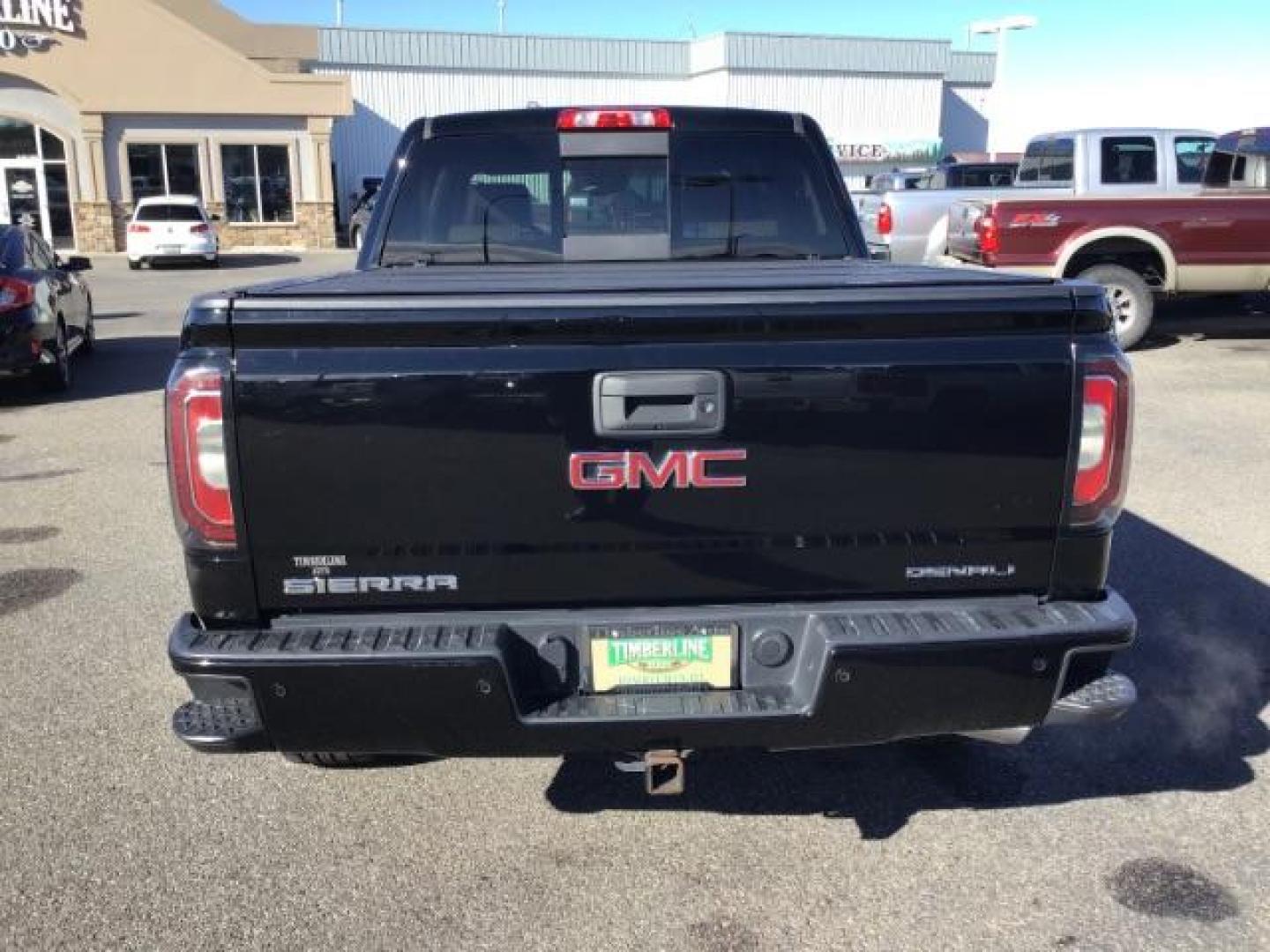 2018 Onyx Black /Cocoa/Dark Sand, leather GMC Sierra 1500 Denali Crew Cab Short Box 4WD (3GTU2PEJ0JG) with an 6.2L V8 OHV 16V engine, 6-Speed Automatic transmission, located at 1235 N Woodruff Ave., Idaho Falls, 83401, (208) 523-1053, 43.507172, -112.000488 - This 2018 GMC 1500 Denali has the 6.2L motor. It has 84,620. This is a really nice truck, that is loaded up with options. At Timberline Auto it is always easy to find a great deal on your next vehicle! Our experienced sales staff can help find the right vehicle that will fit your needs. Our knowledg - Photo#3